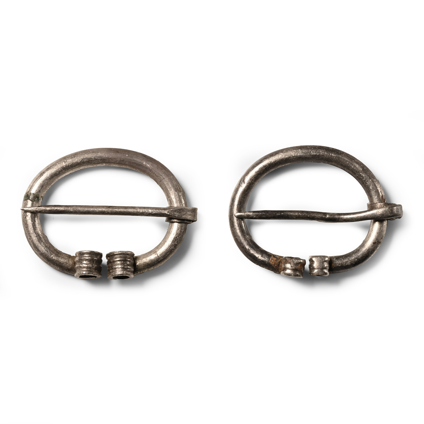 Viking Age Silver Penannular Brooch Pair