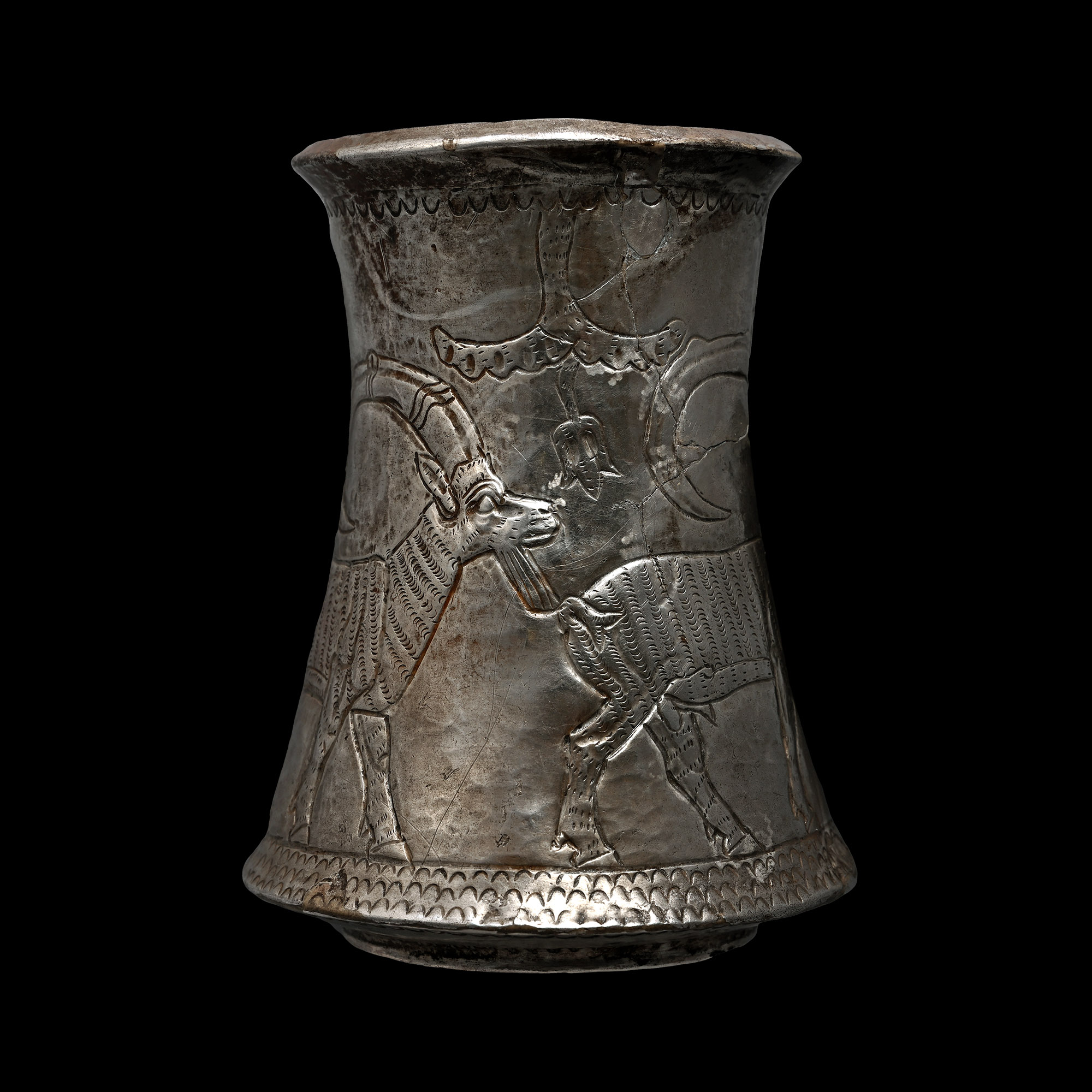 Elamite Silver Beaker with Three Ibexes