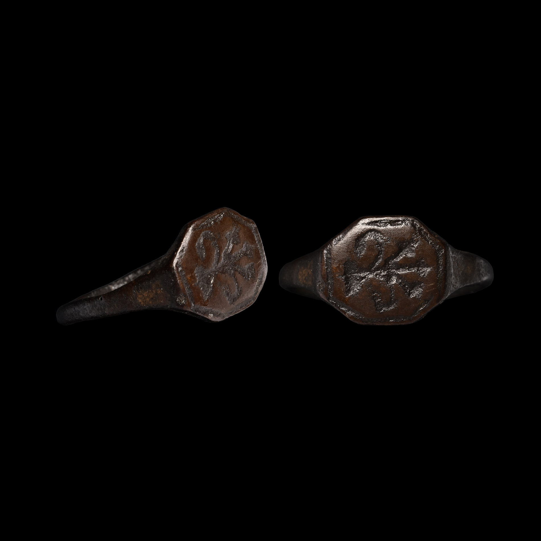 Tudor Period Bronze Ring with Hexagonal Bezel and Armorial Motif