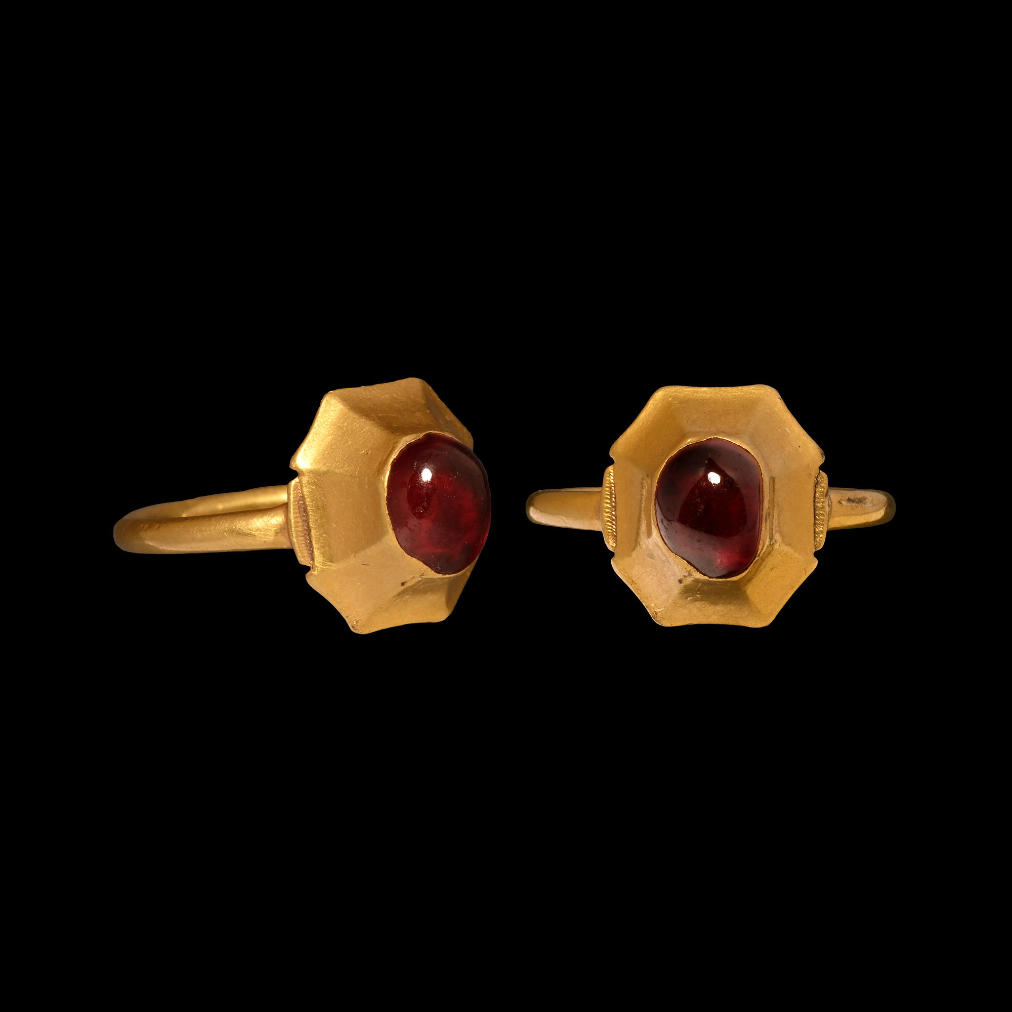 Large Medieval Gold Ring with Cabochon Garnet