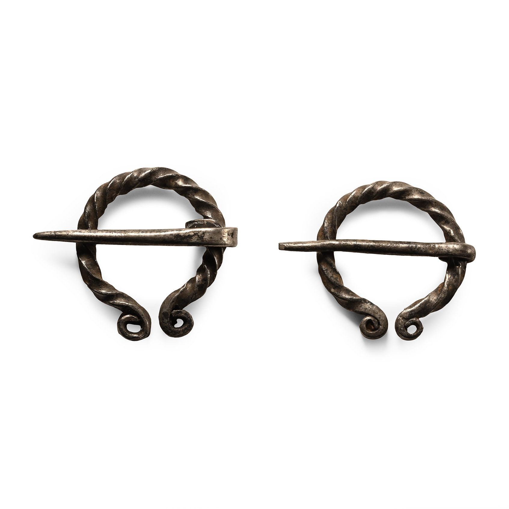 Viking Period Silver Penannular Brooch Pair