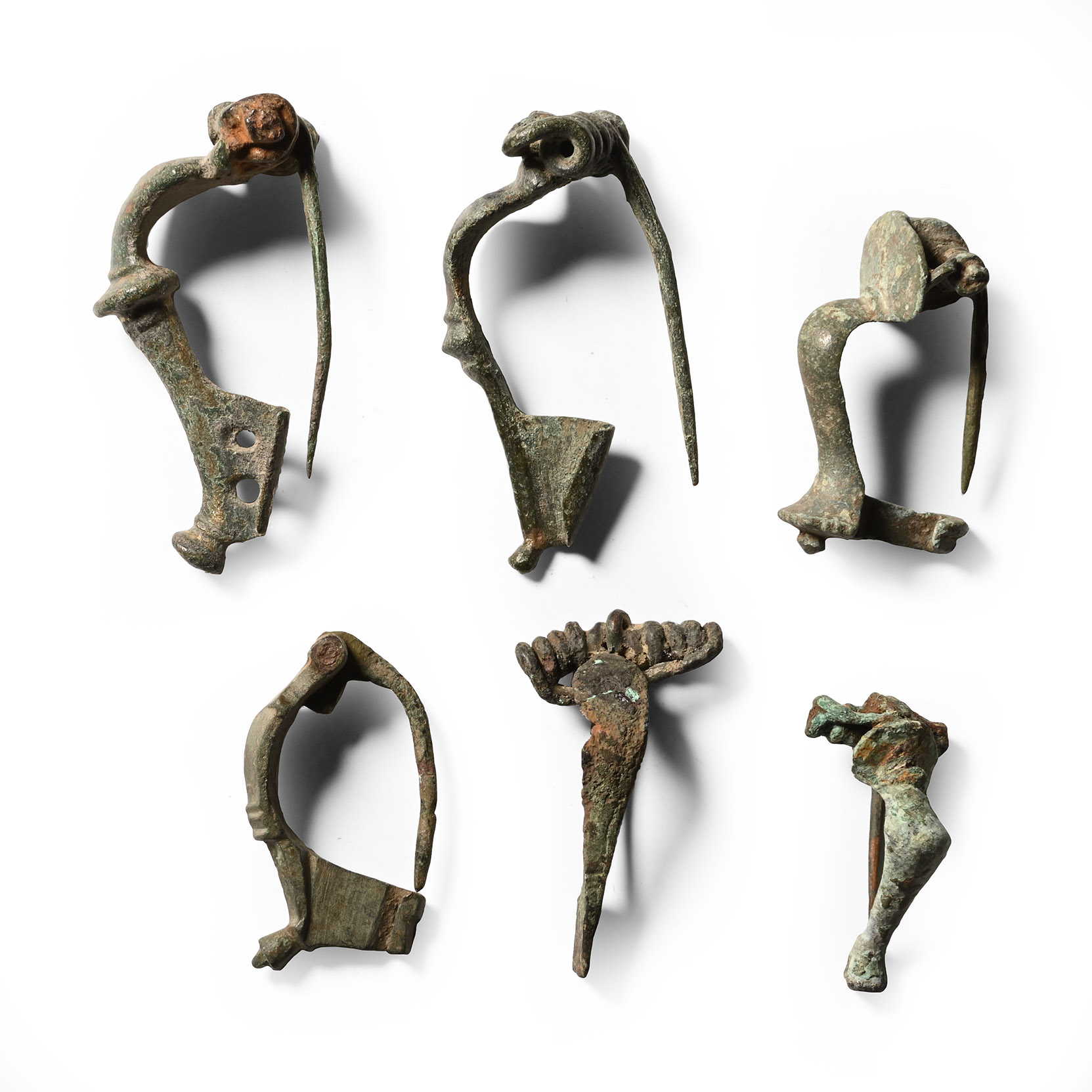 Roman Bronze Bow Brooch Group
