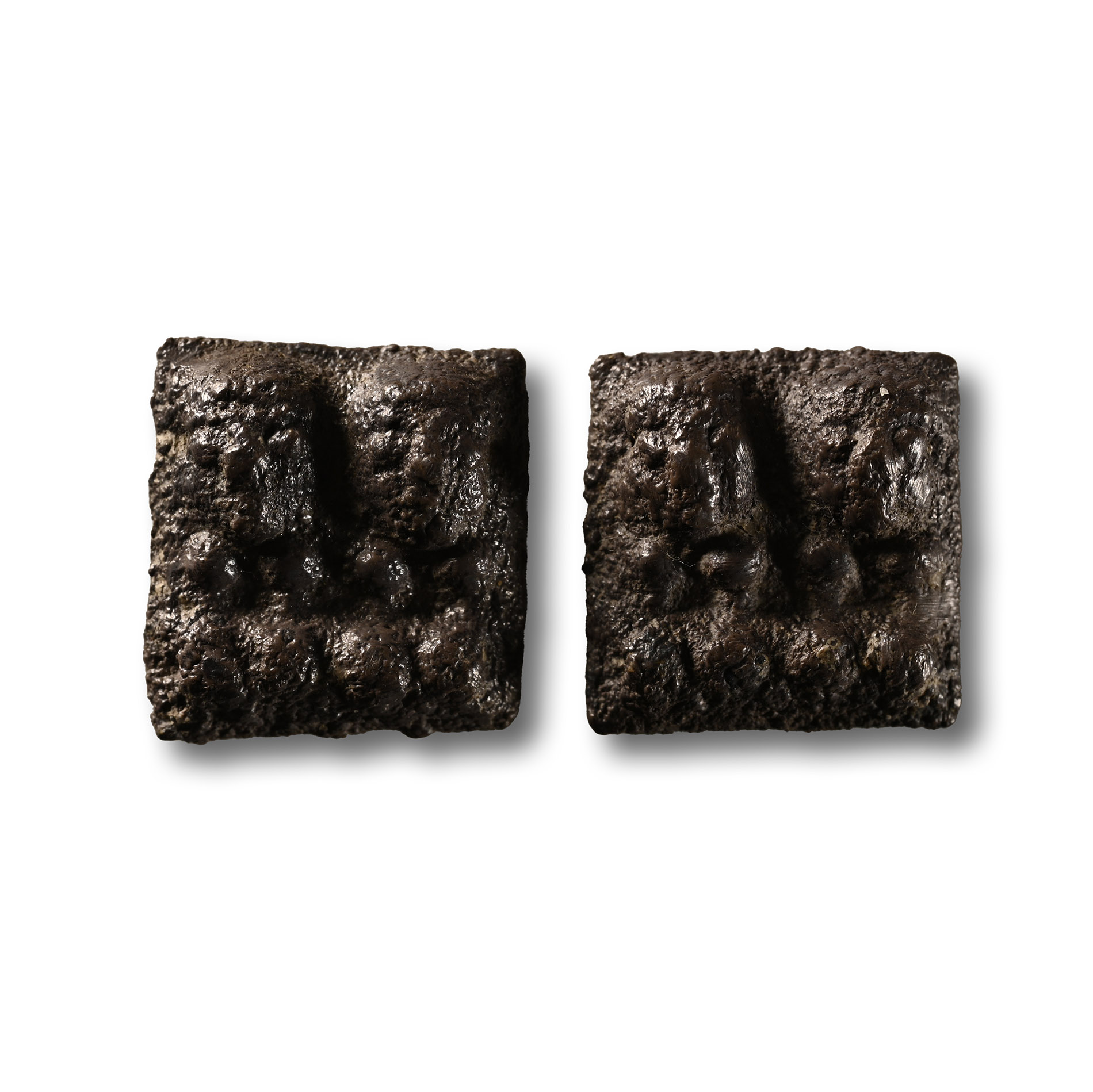 Western Asiatic Silver Inlay Pair with Human Heads and Animals