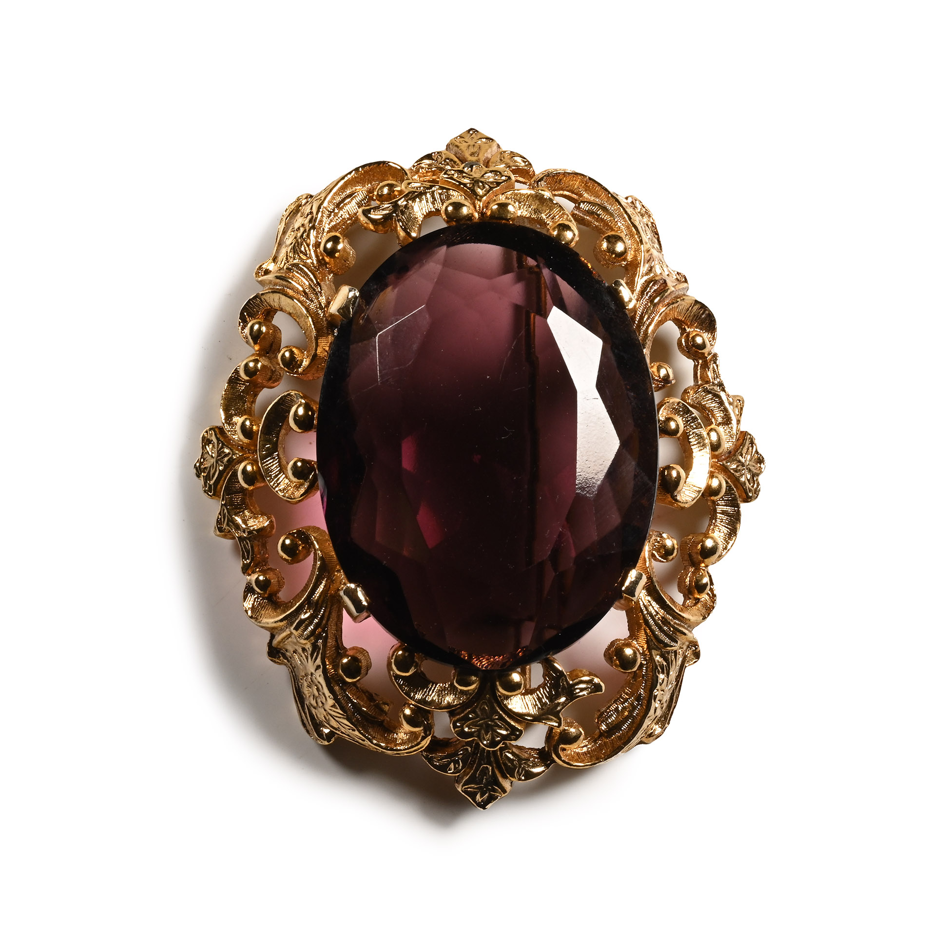Large Gilt Brooch with Facetted Glass Gem