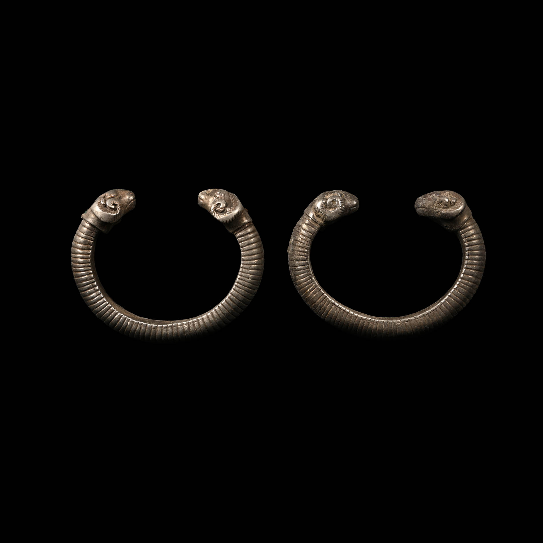 Achaemenid Silver Ram-Headed Bracelet Pair