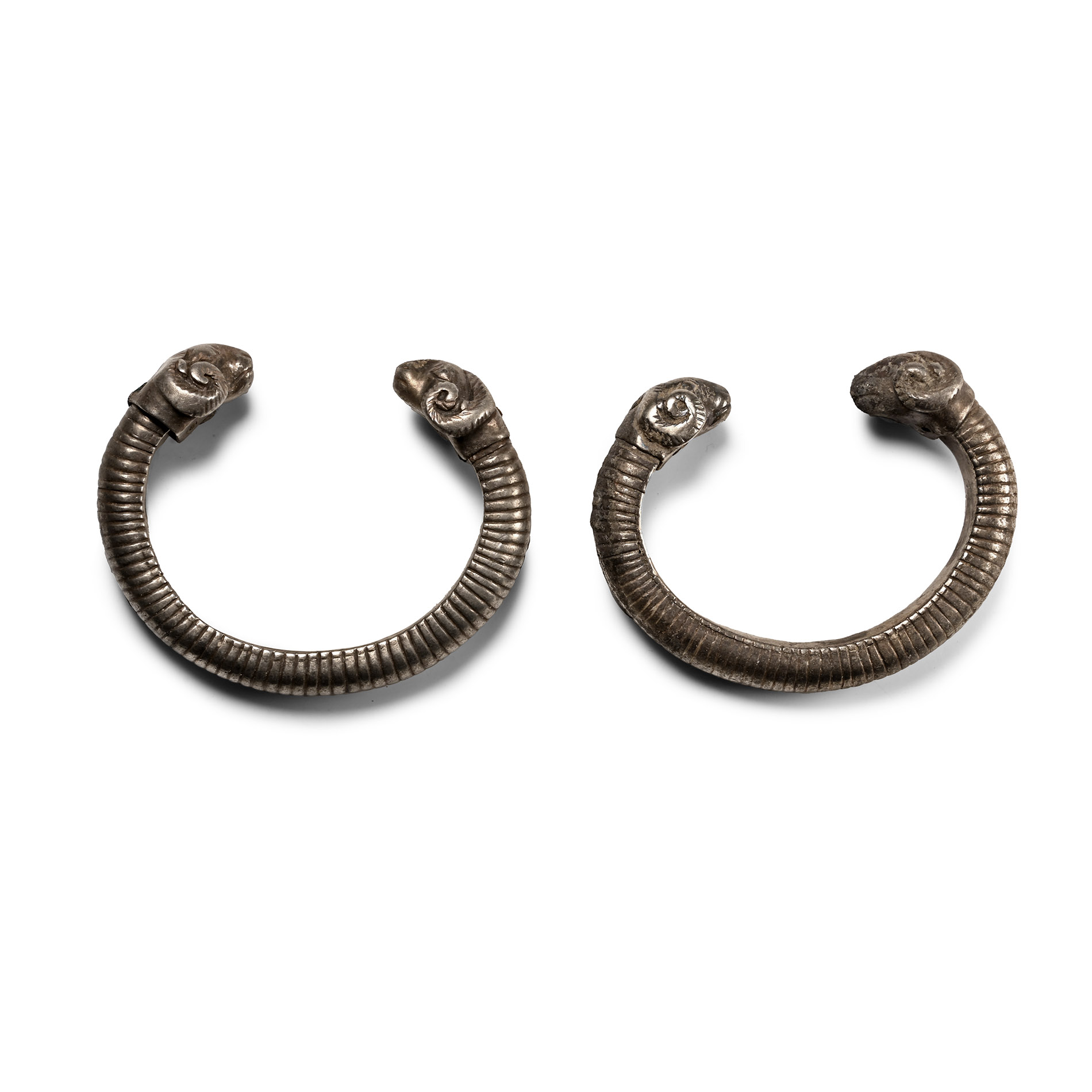 Achaemenid Silver Ram-Headed Bracelet Pair