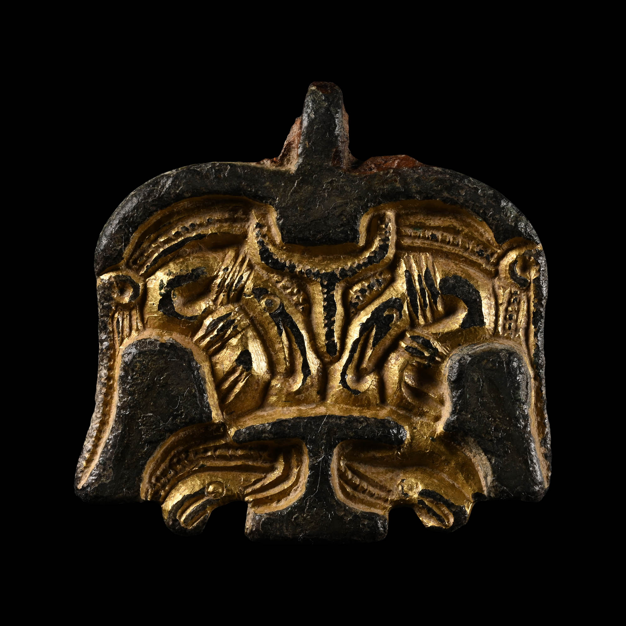 Anglo-Saxon Gilt Bronze Chip-Carved Mount with Face
