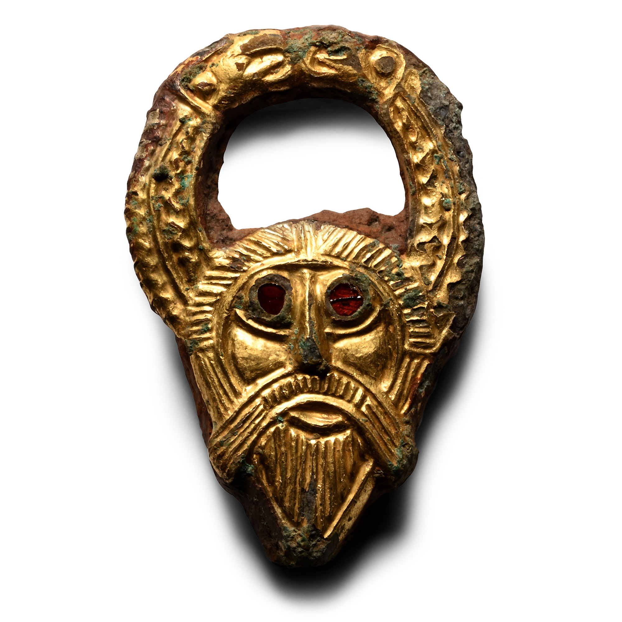 The 'Kingsworthy' Anglo-Saxon Gilt-Bronze Horned Woden's Head Appliqué