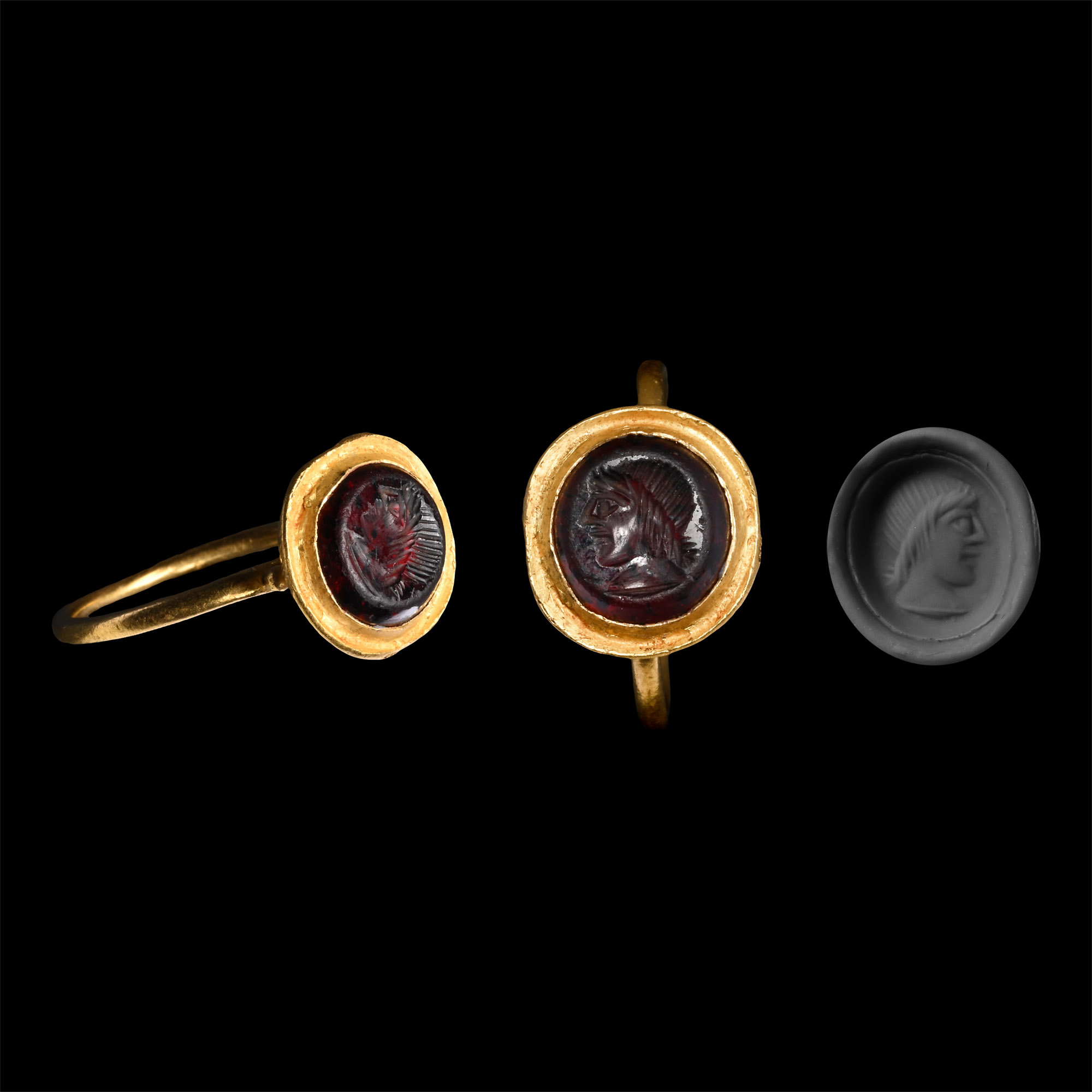 Late Roman Gold Ring with Garnet Intaglio Depicting a Male Portrait