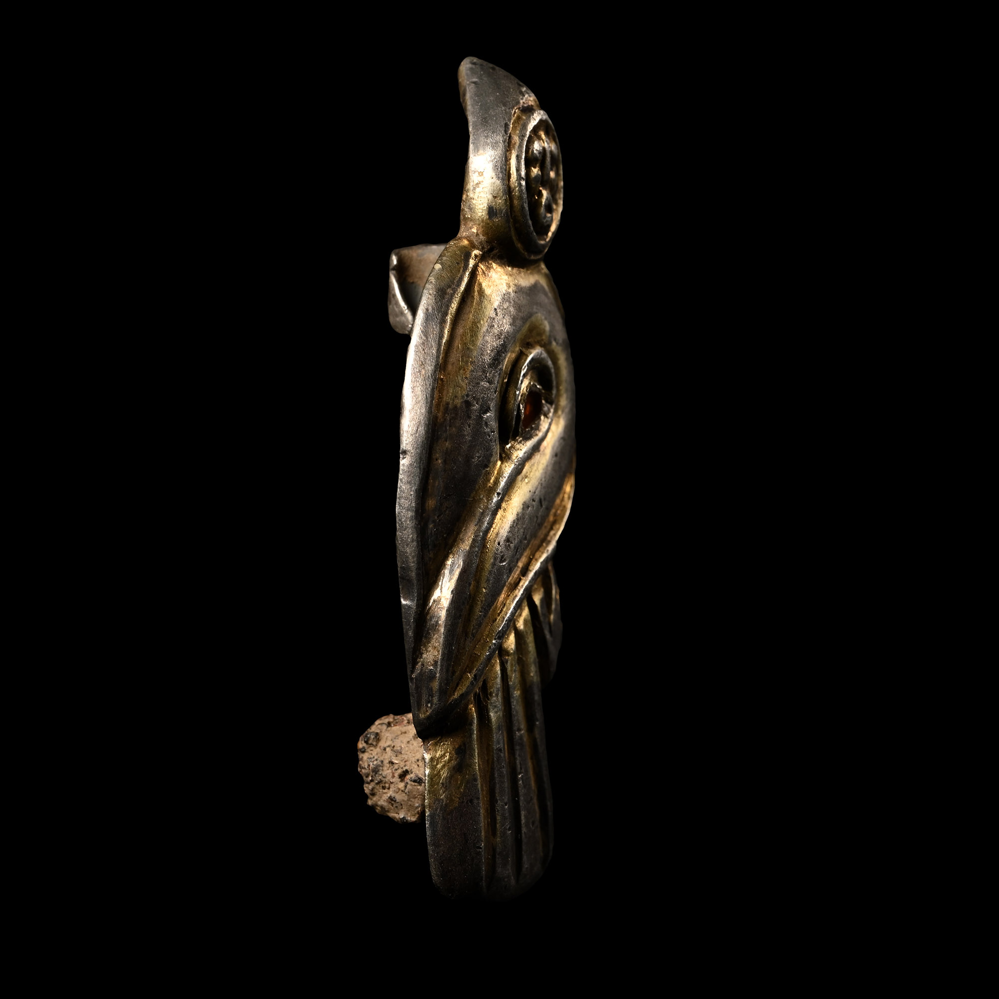 Pre-Viking Silver-Gilt Human-Headed Eagle Brooch