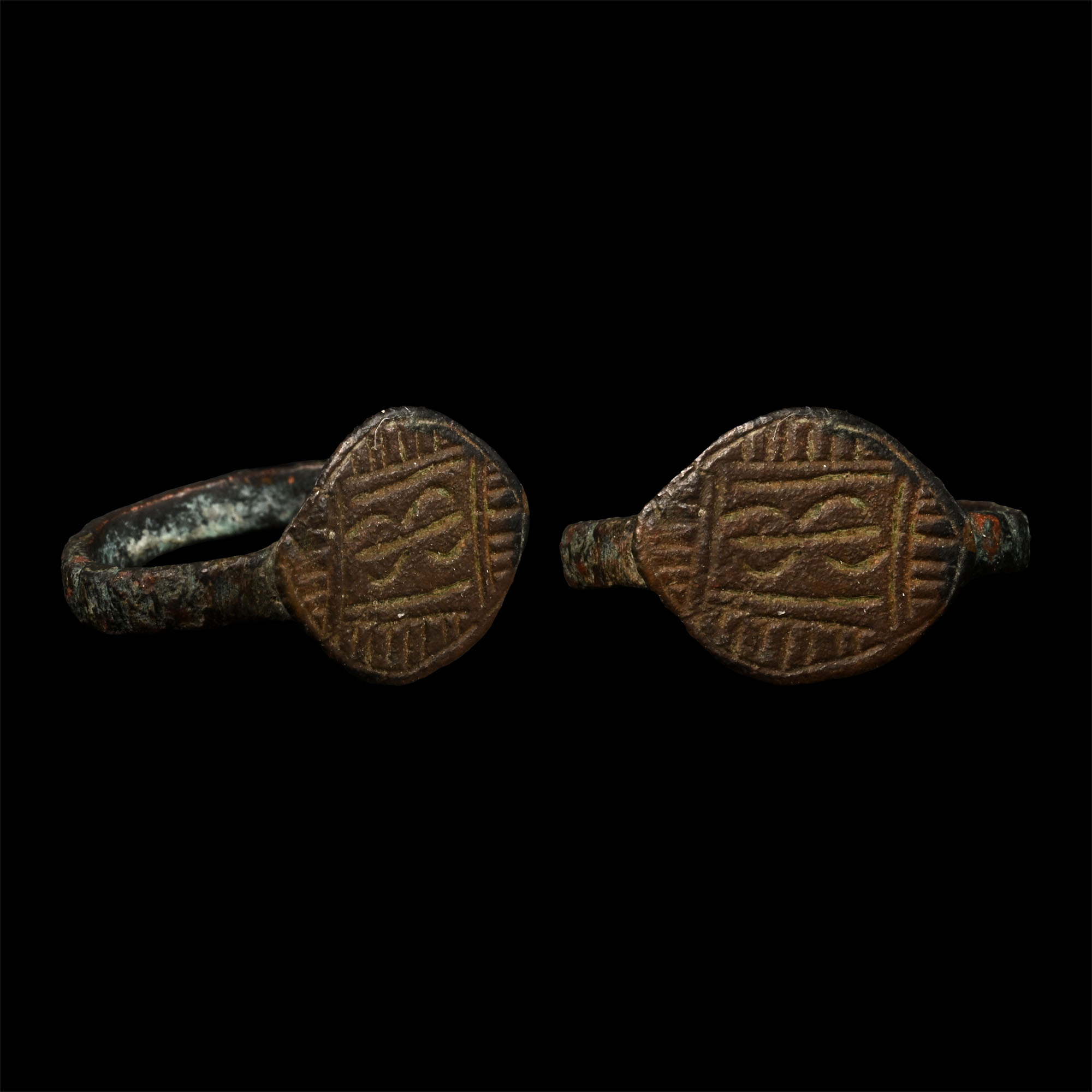 Medieval Bronze Ring with Hour Glass Motif