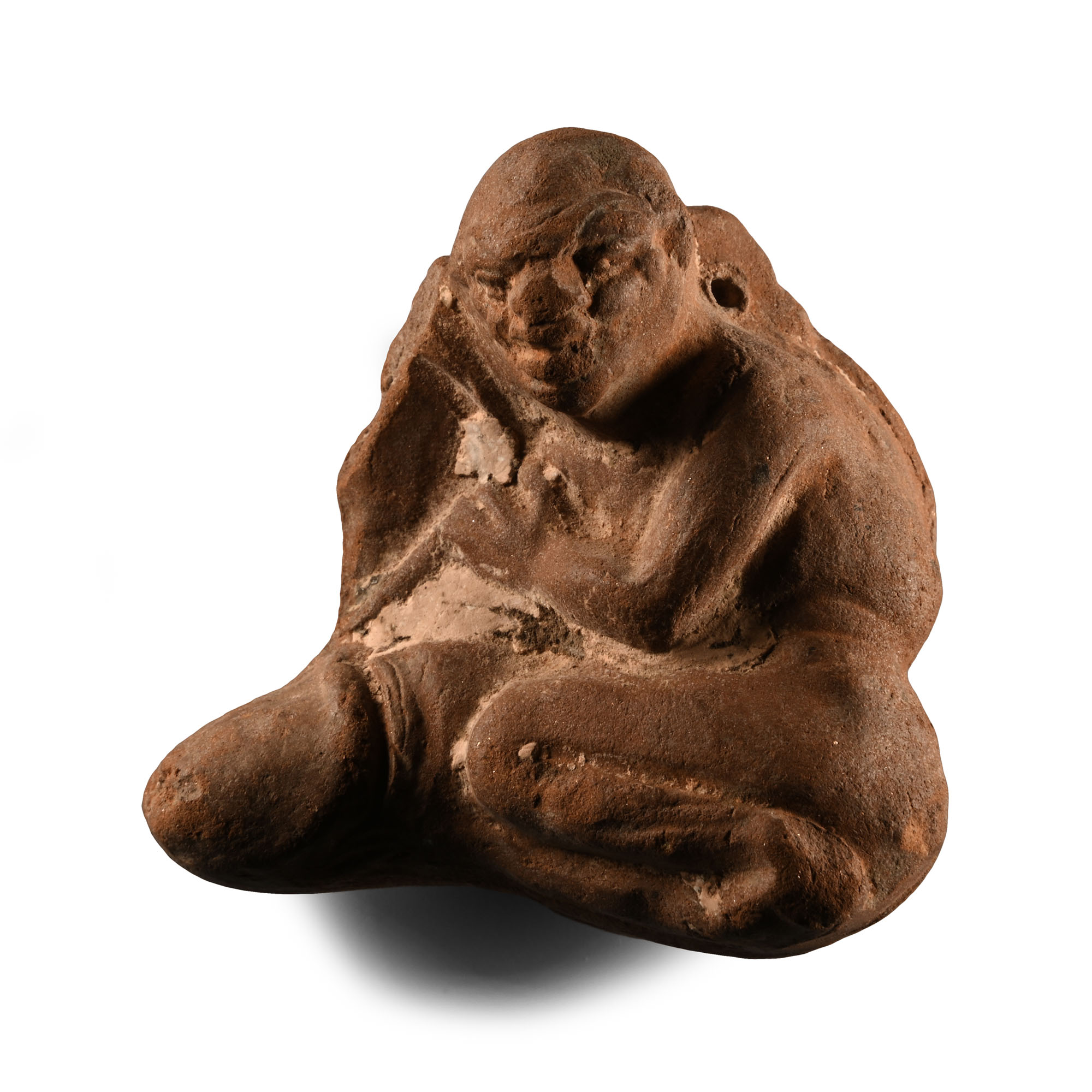 Egyptian Terracotta Ithyphallic Figurine of a Seated Male