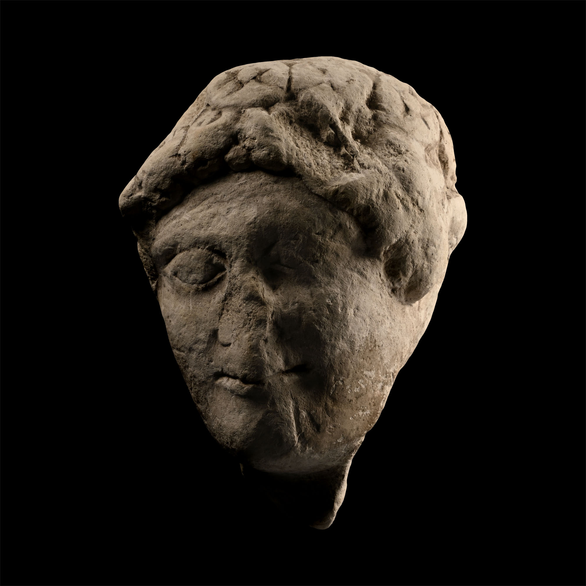 Cypriot Head of a Youth with a Floral Crown