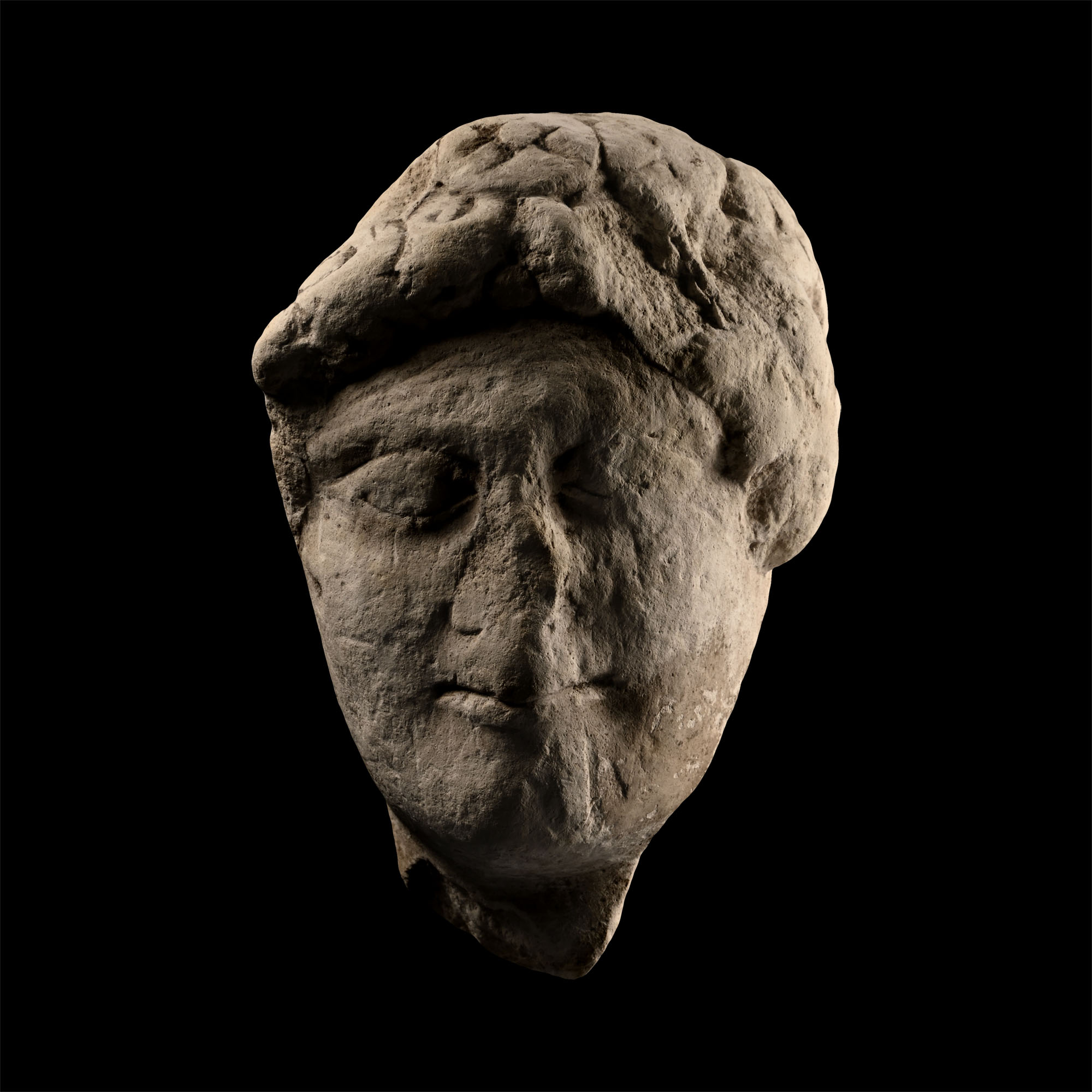 Cypriot Head of a Youth with a Floral Crown