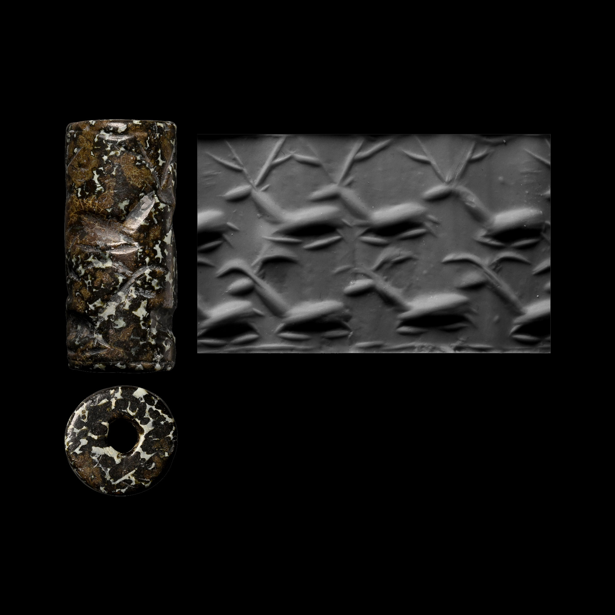 Northern Mesopotamian Black Stone Cylinder Seal with Rows of Horned Animals