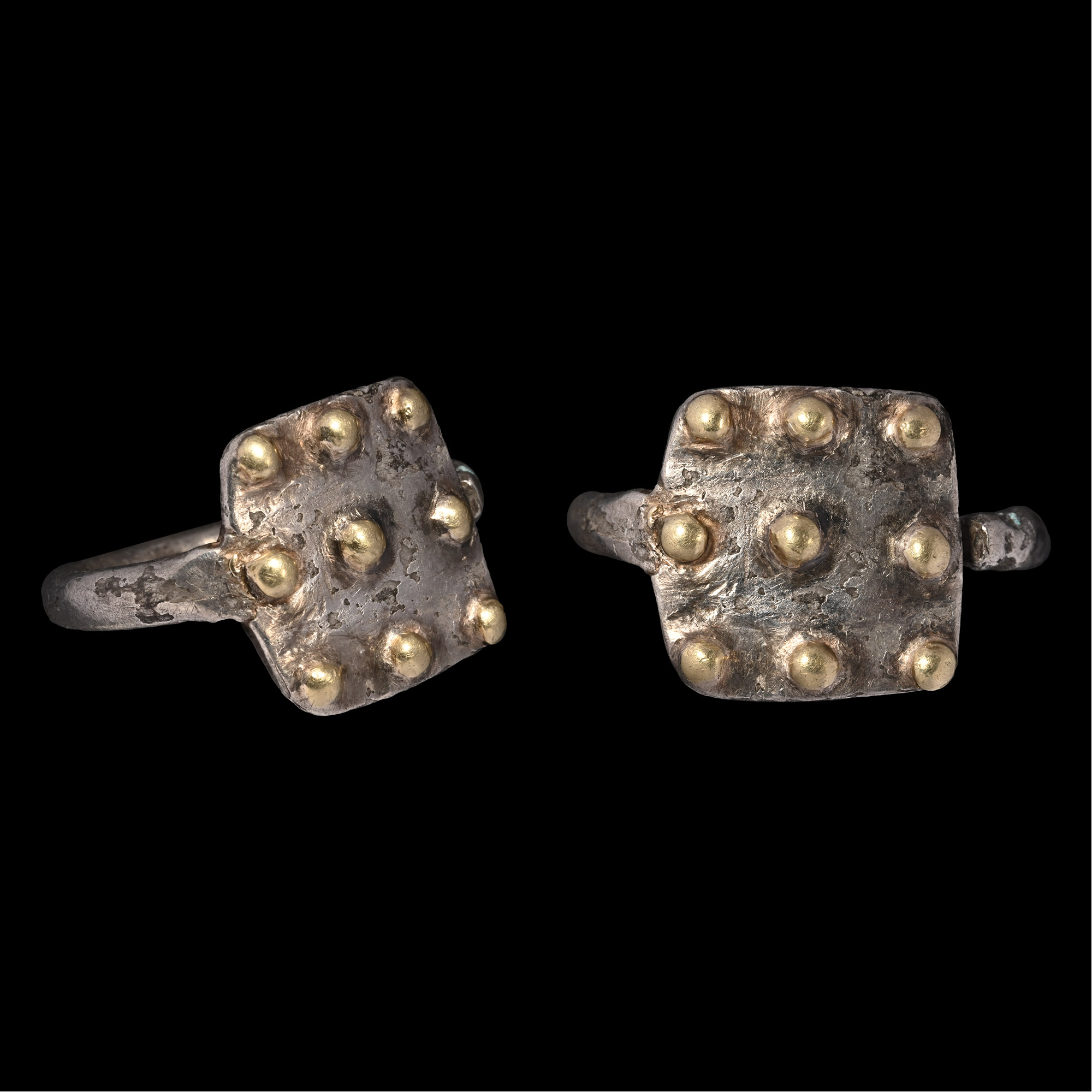 Western Asiatic Silver-Gilt Ring with Bosses