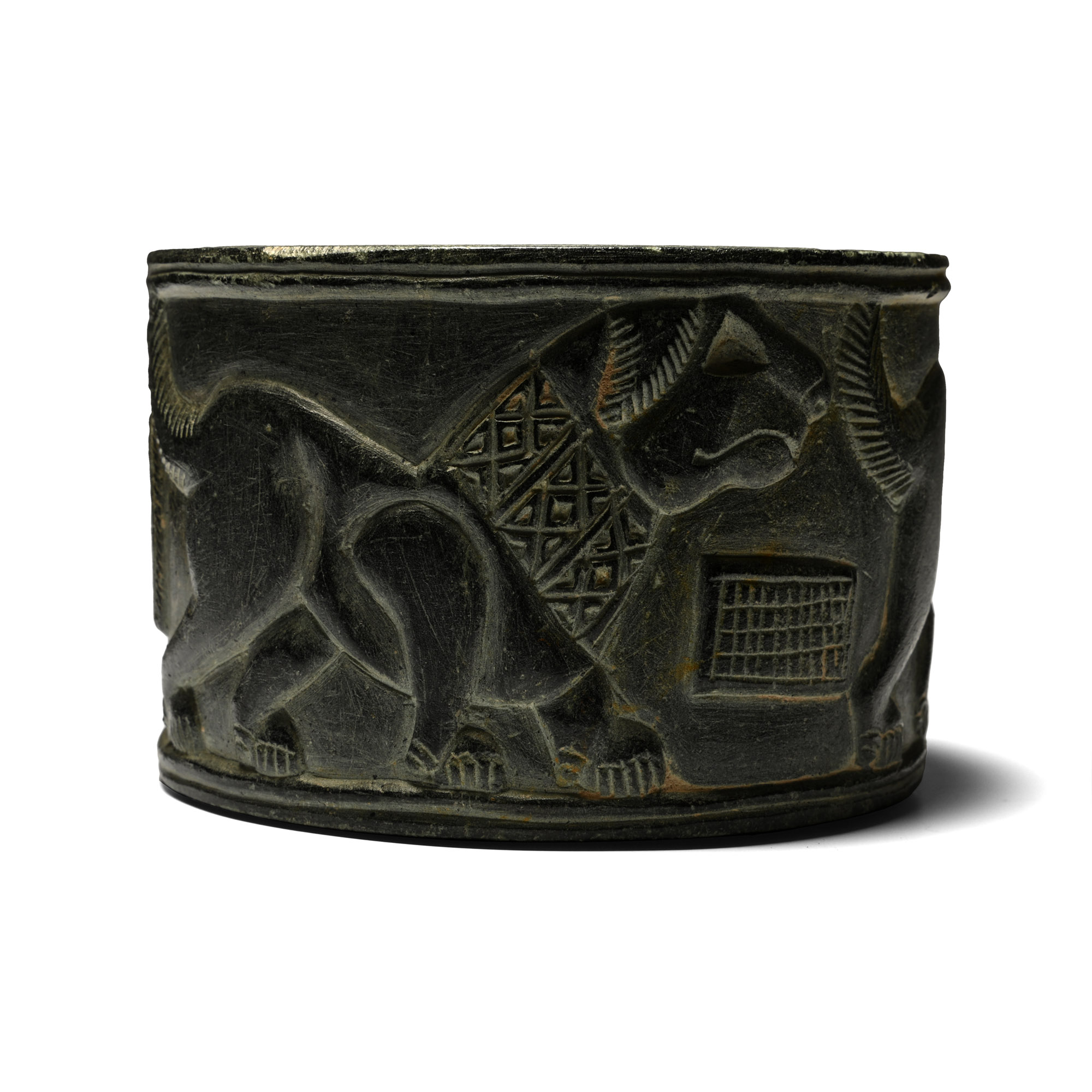 Bactrian Stone Bowl with Two Lions and Female Figure