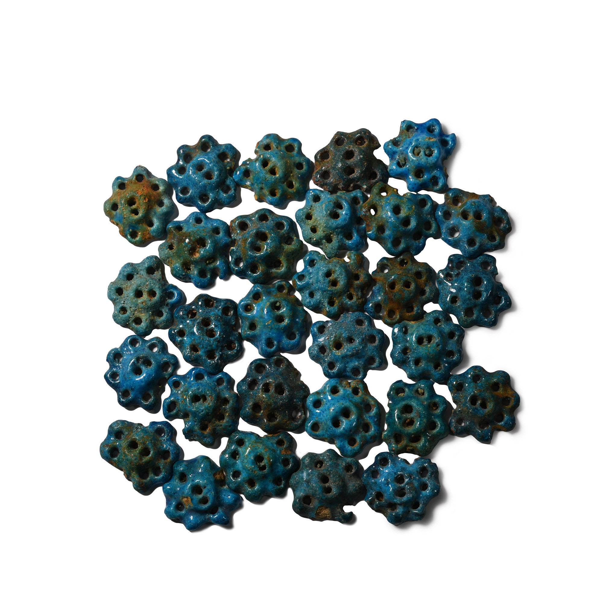 Egyptian Blue Faience Clothing Mounts