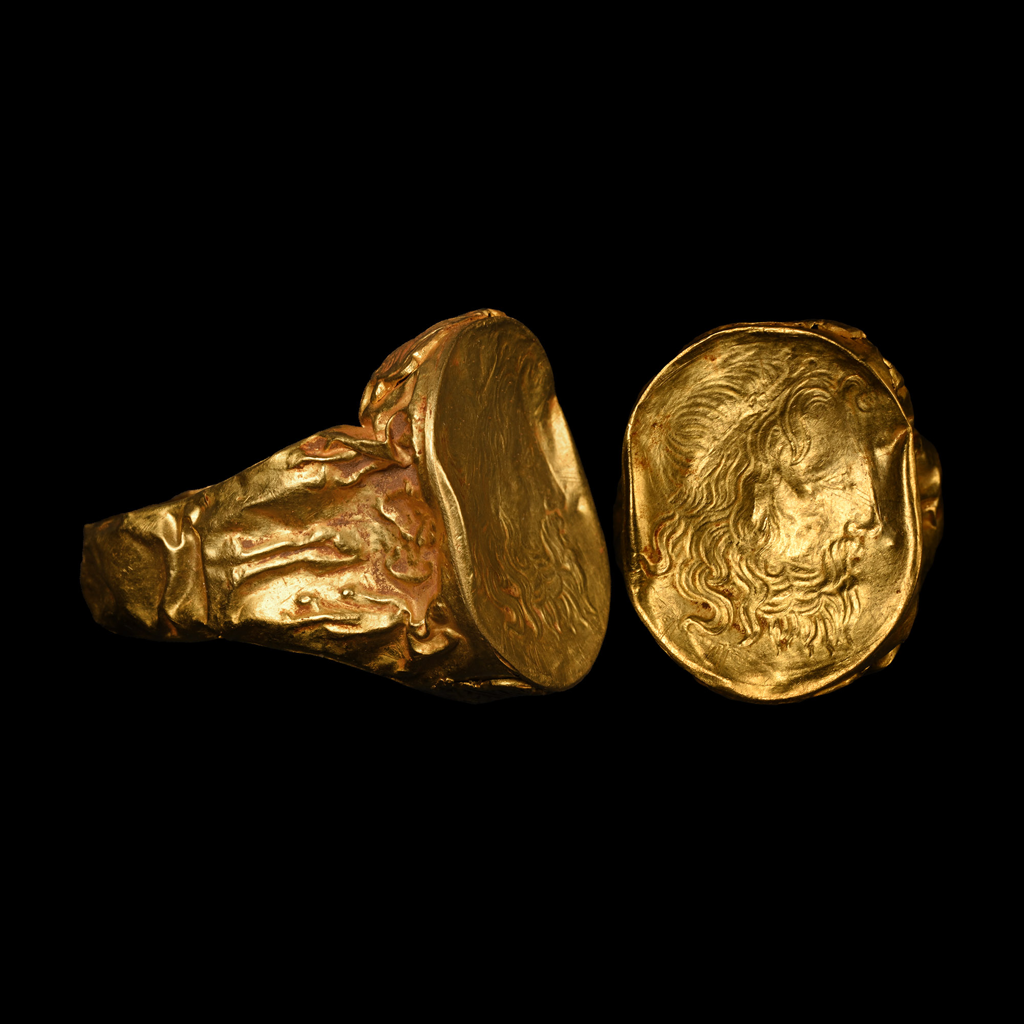 Very Large Roman Gold Ring with Engraved Head of the God Neptune and Warships