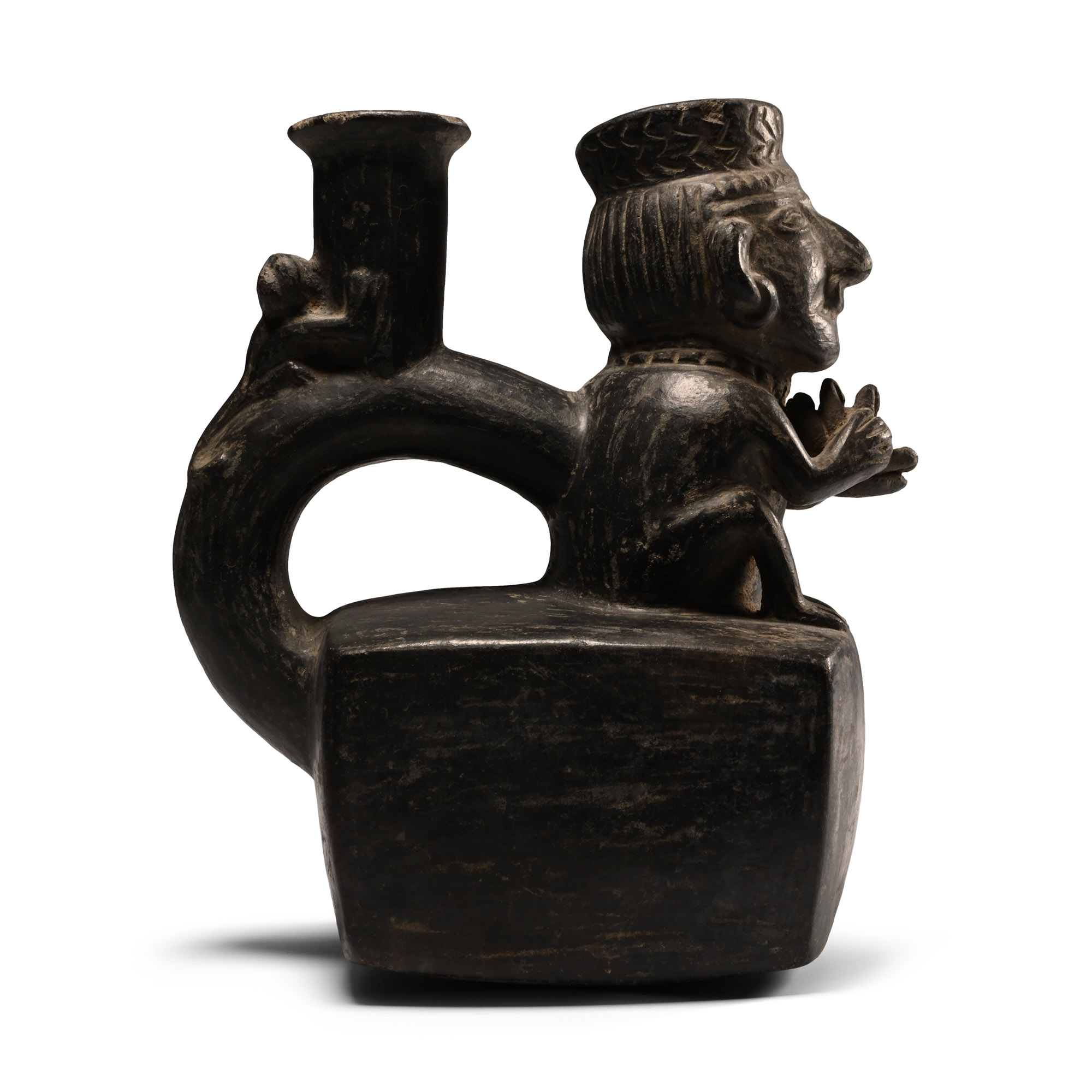 Moche Painted Pottery Stirrup Jar with Crouching Figure