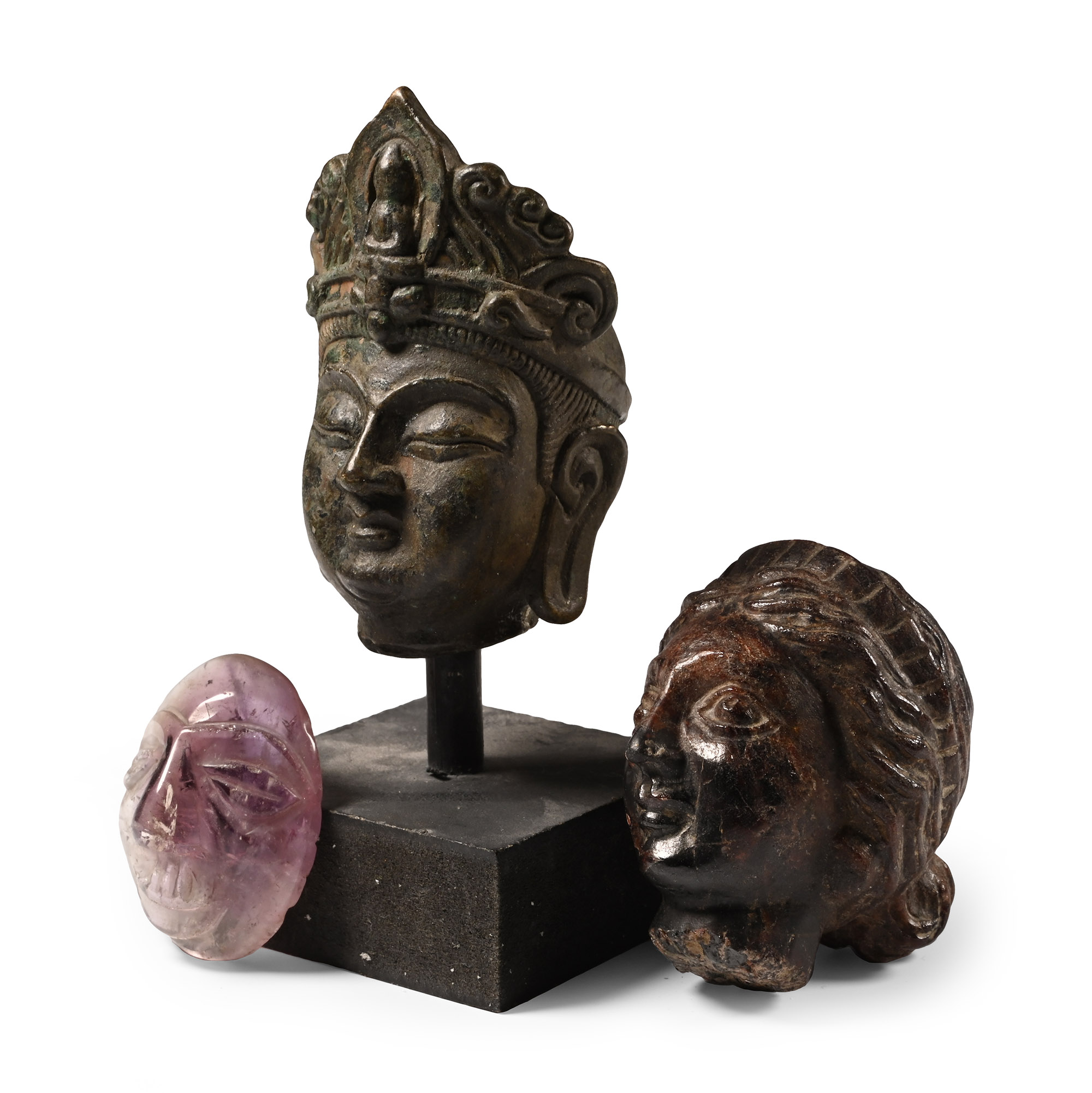 Bronze and Stone Head Group