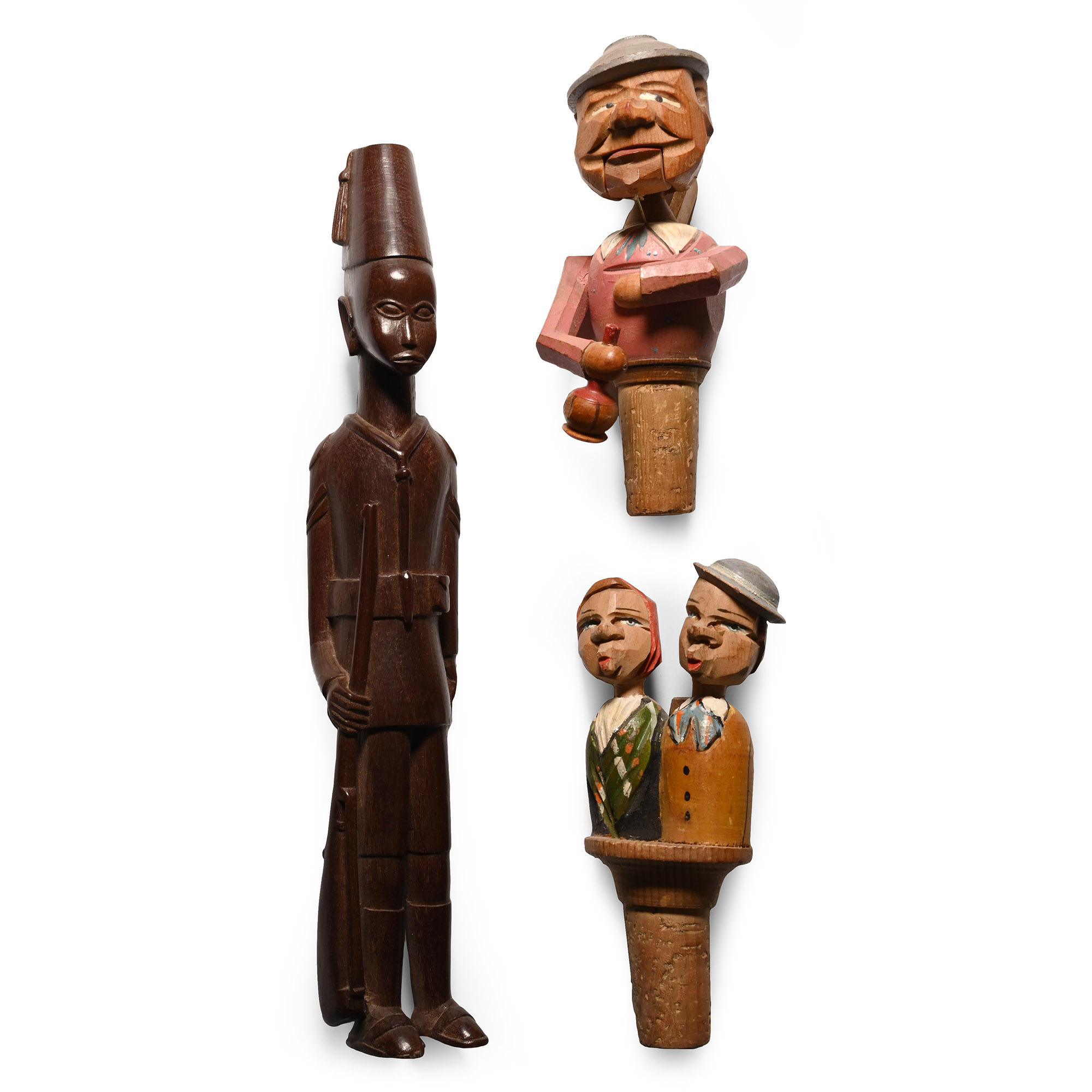 Wooden Figure and Articulated Figural Bottle Stop Group