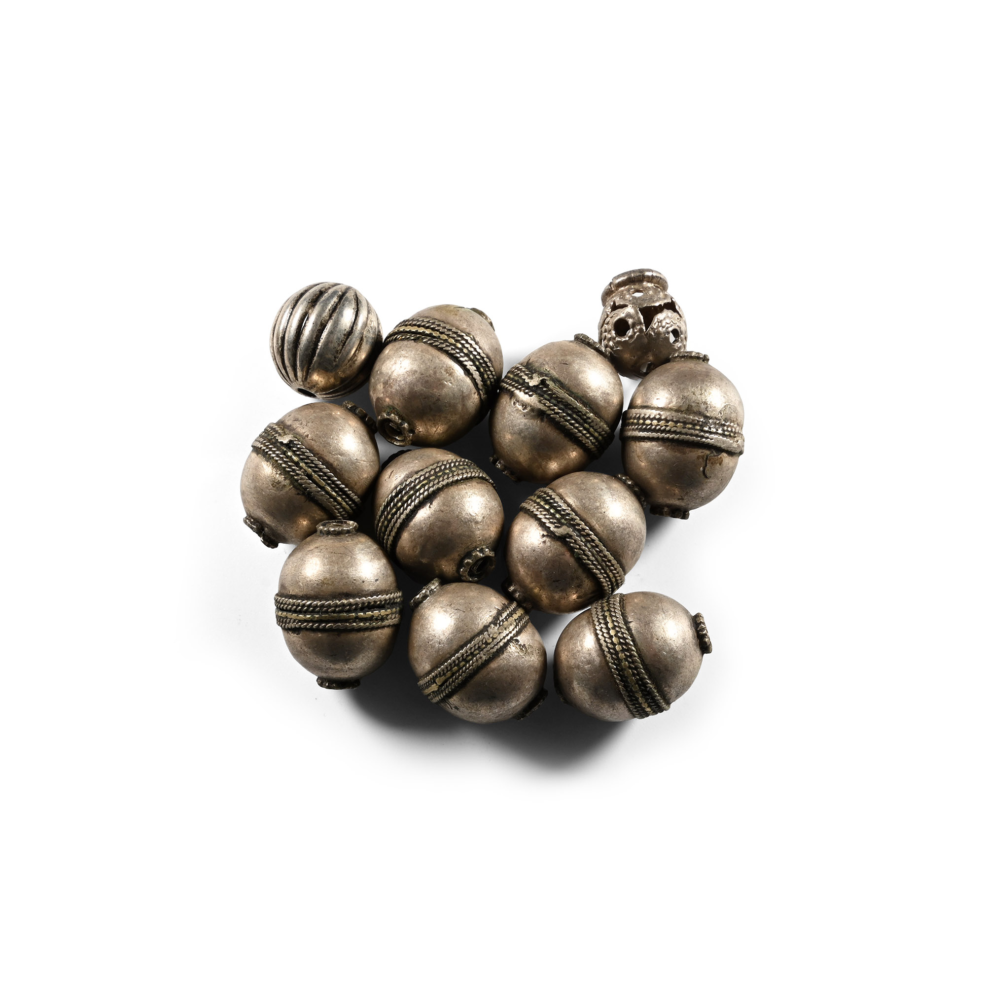 Western Asiatic Silver-Coloured Metal Bead Group