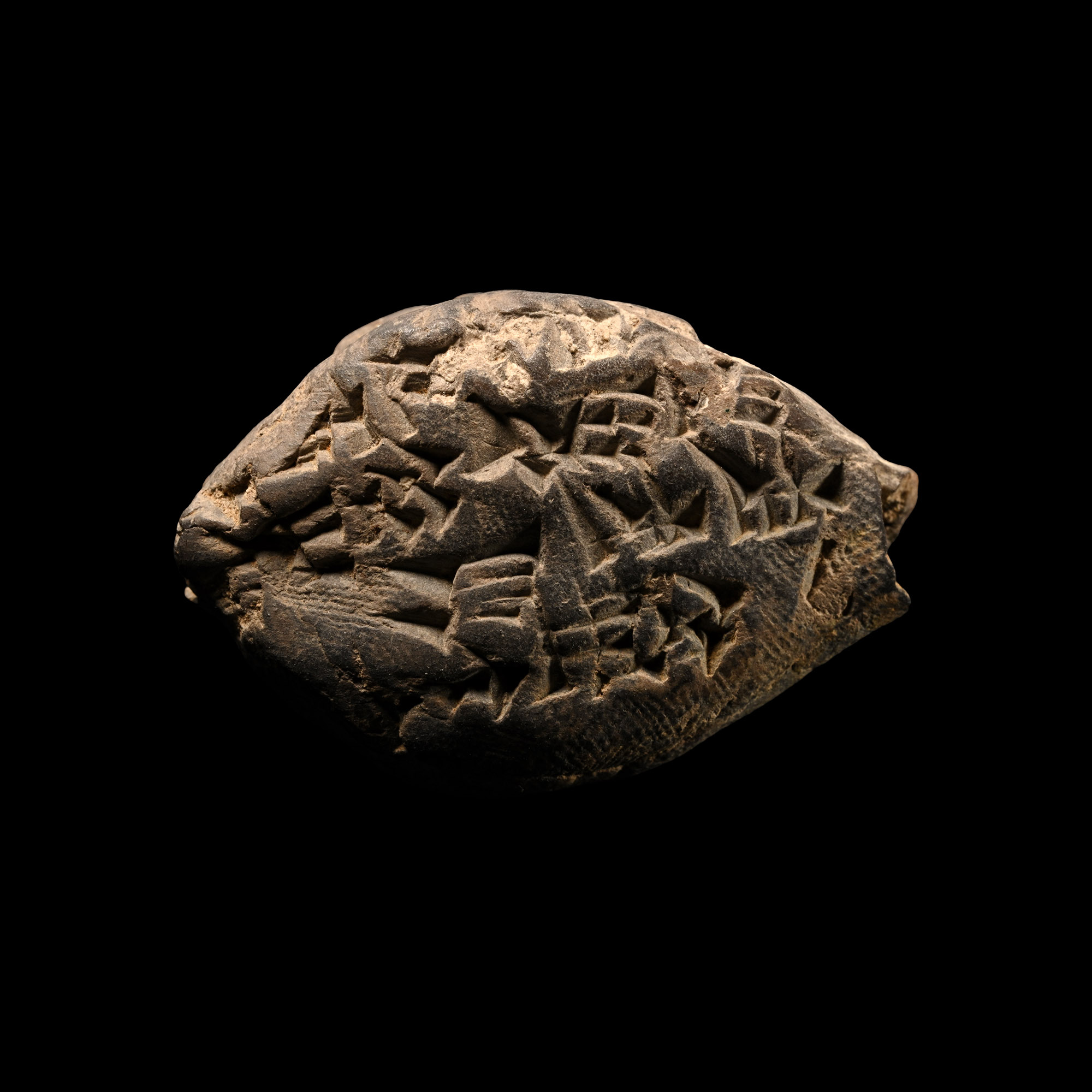 Old Babylonian Terracotta Cuneiform Tag Recording the Delivery of Sheep Carcasses