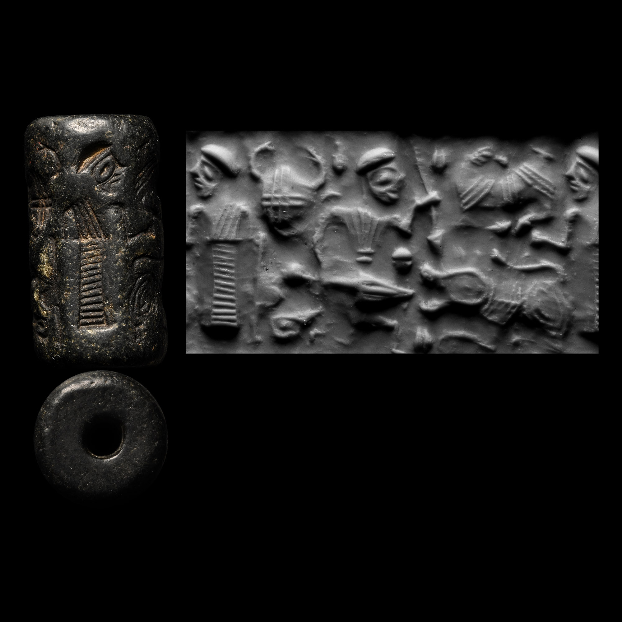 Western Asiatic Black Stone Cylinder Seal with Figural Scene