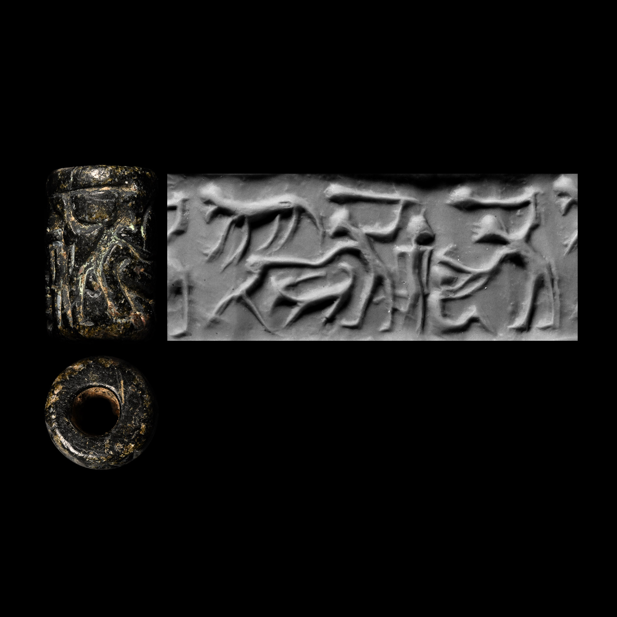 Anatolian Black Stone Cylinder Seal with Figures Holding Clubs