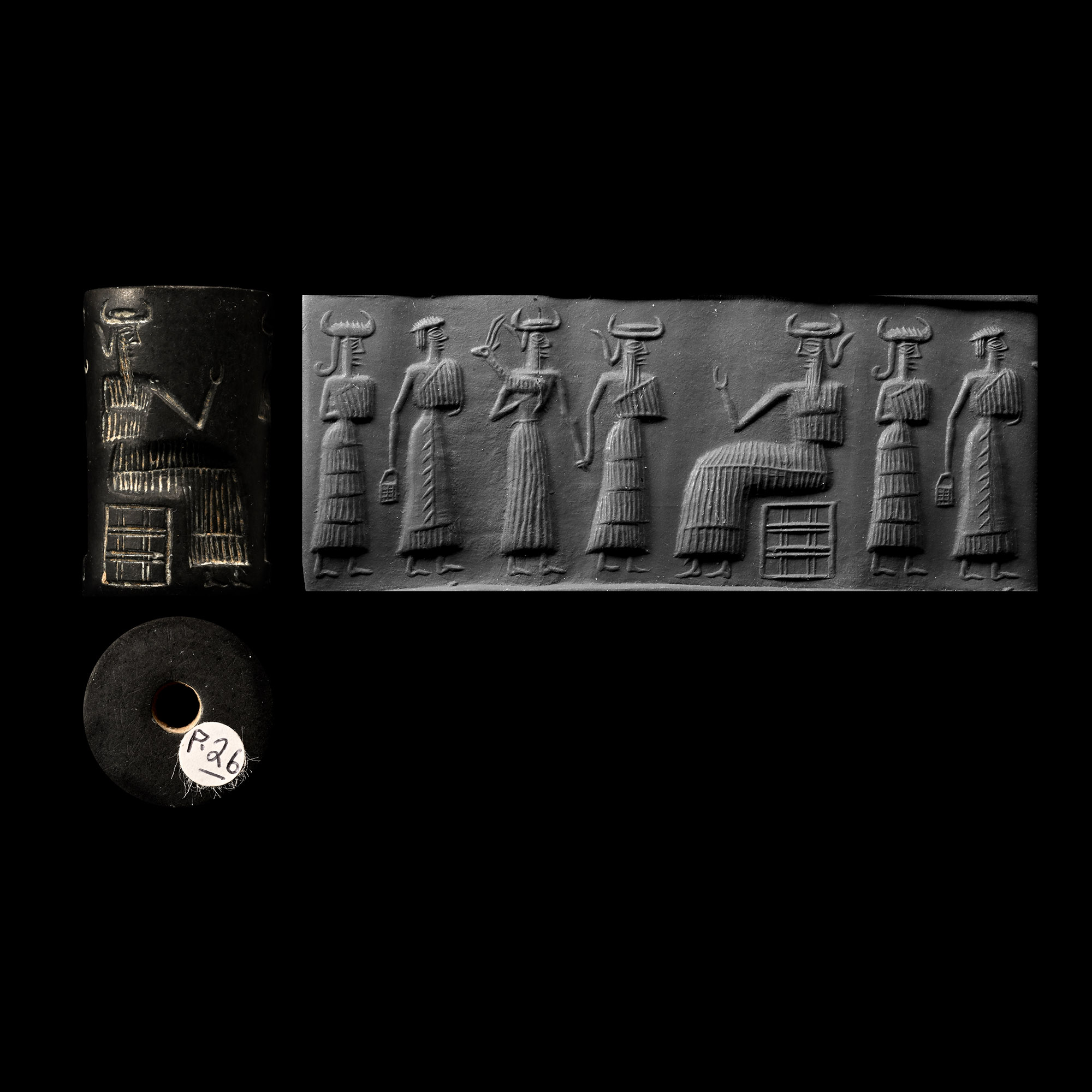 Large Akkadian Black Stone Cylinder Seal with Figures
