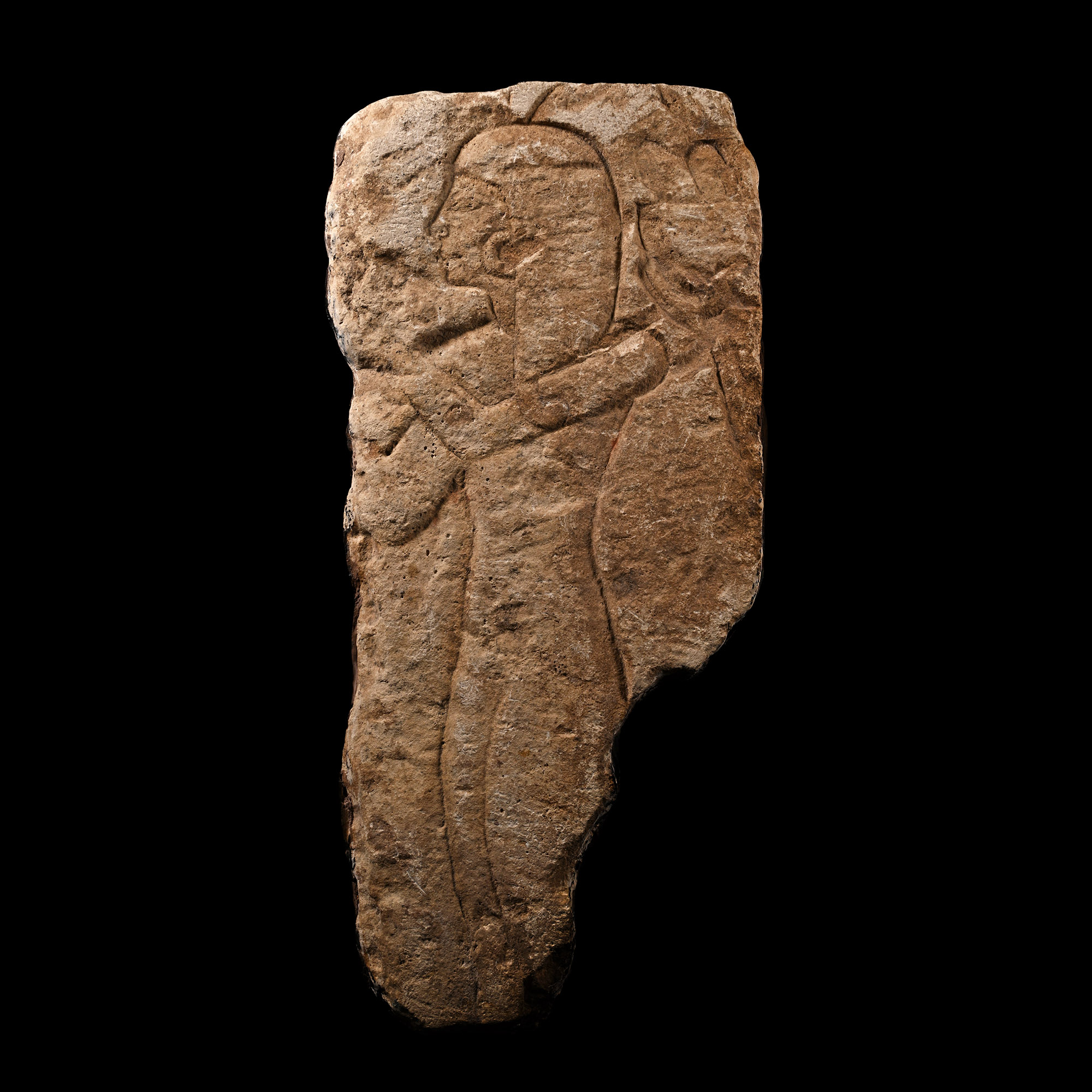 Egyptian Limestone Relief Fragment with Female Figure