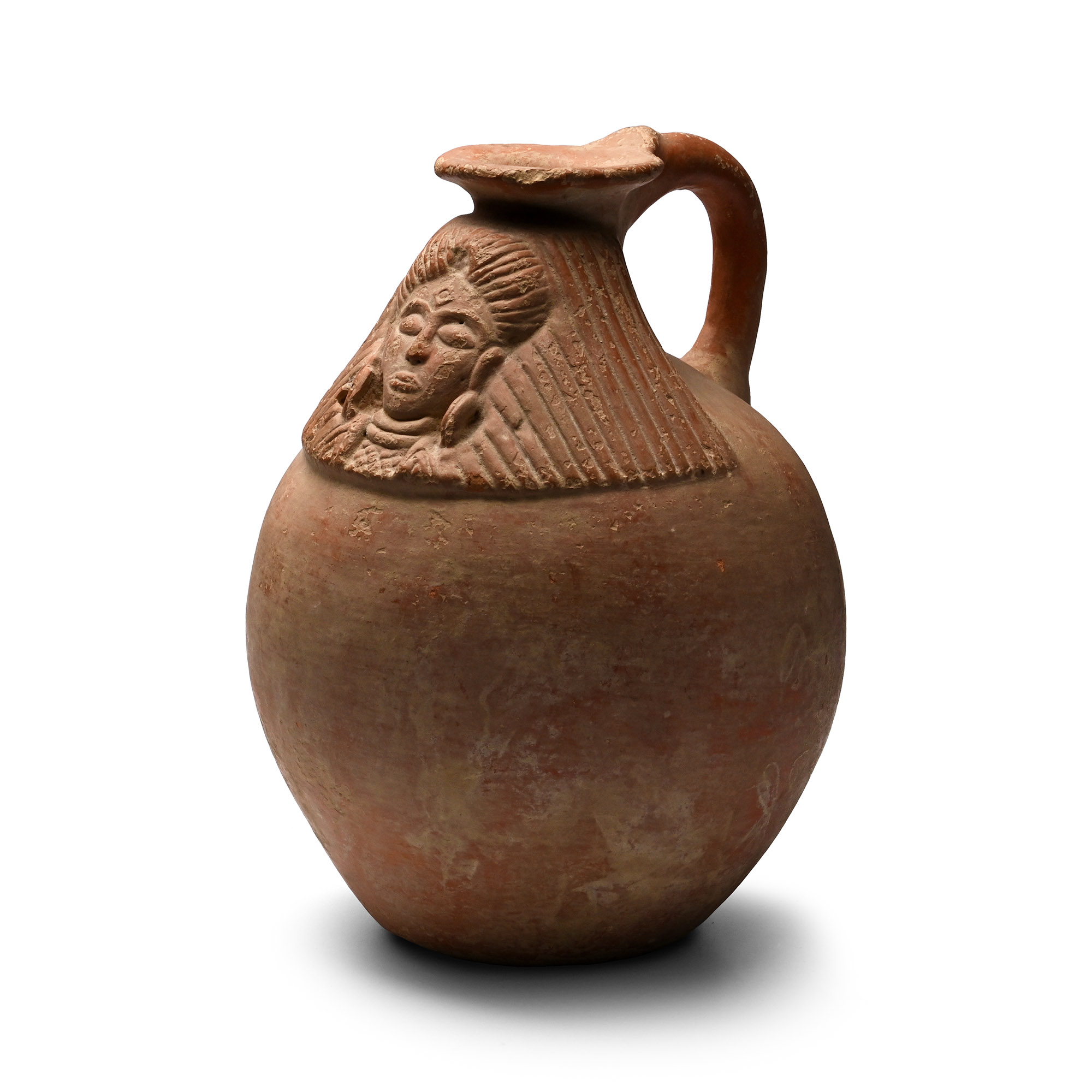 Western Asiatic Red Terracotta Jug with Face