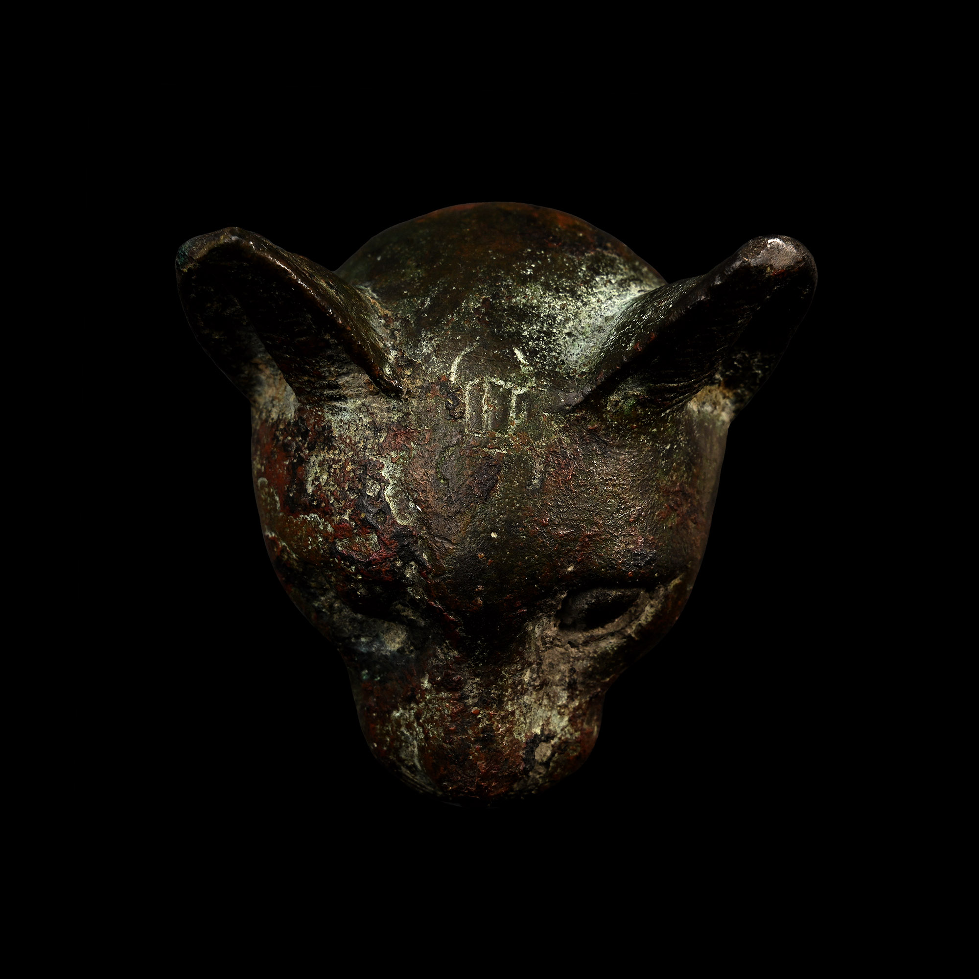 Egyptian Bronze Cat Head with Incised Scarab