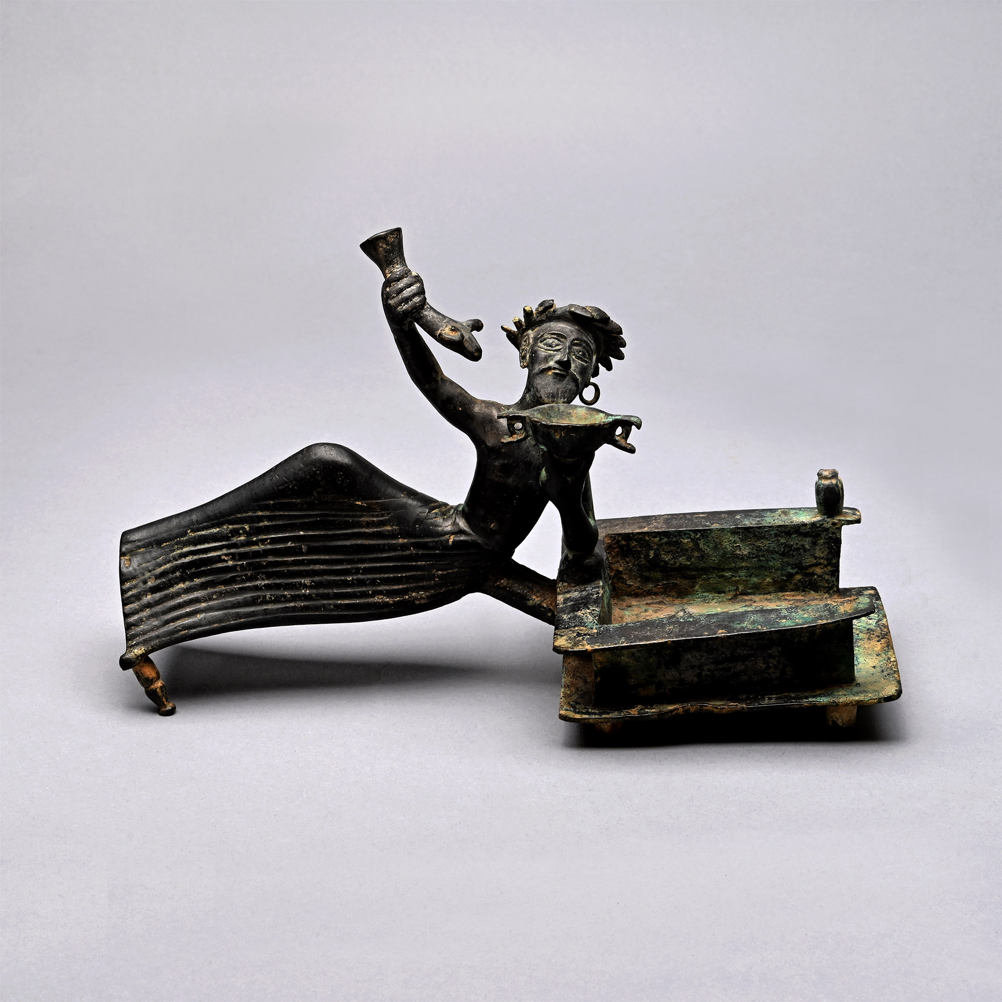 Parthian Bronze Batillum with a Reclining Banqueteer Holding a Skyphos and Rhyton