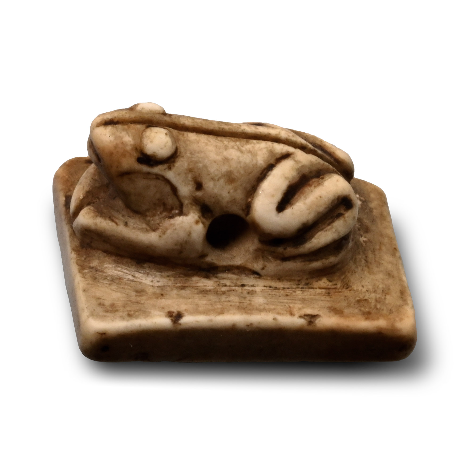 Neo-Babylonian Faience Frog Amulet with Man Plucking a Fruit from a Tree