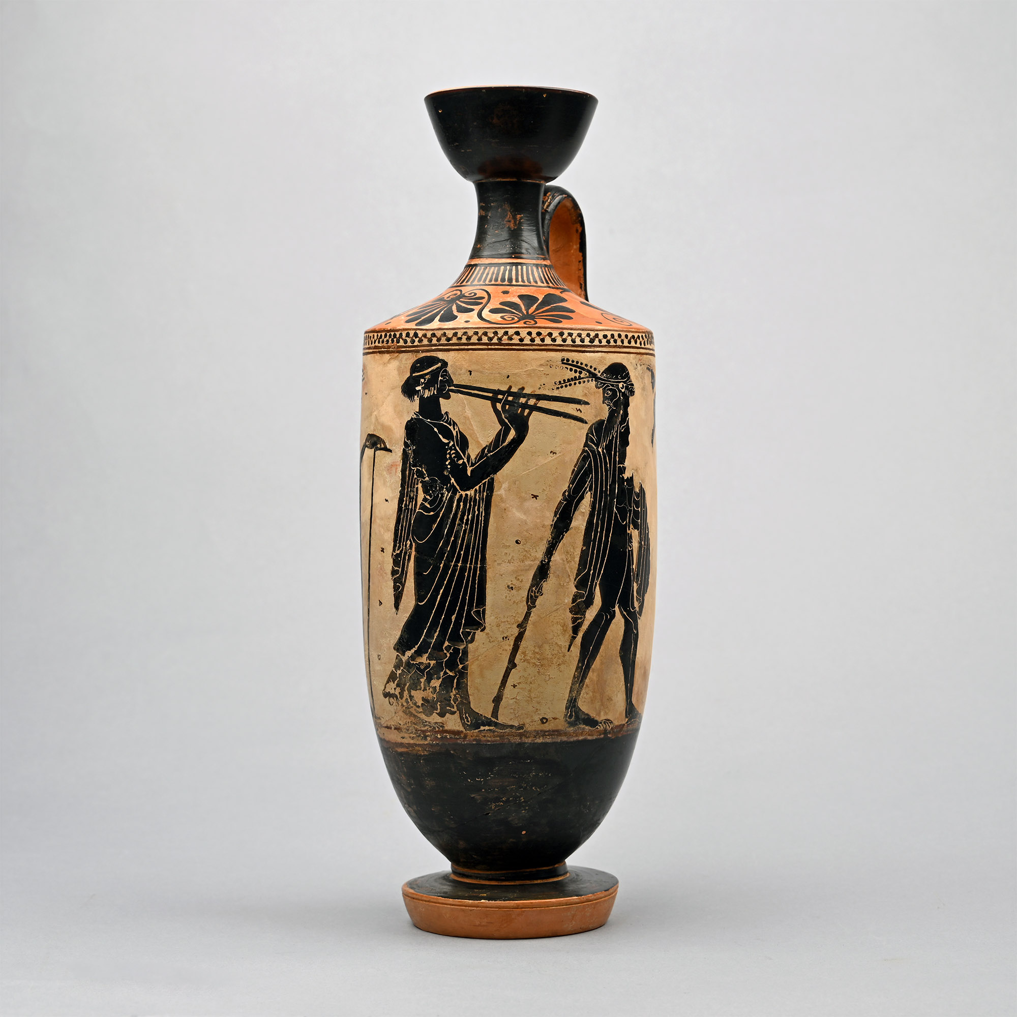 Greek white-ground and black-figure lekythos attributed to the Athena Painter, a double-pipe player in a procession
