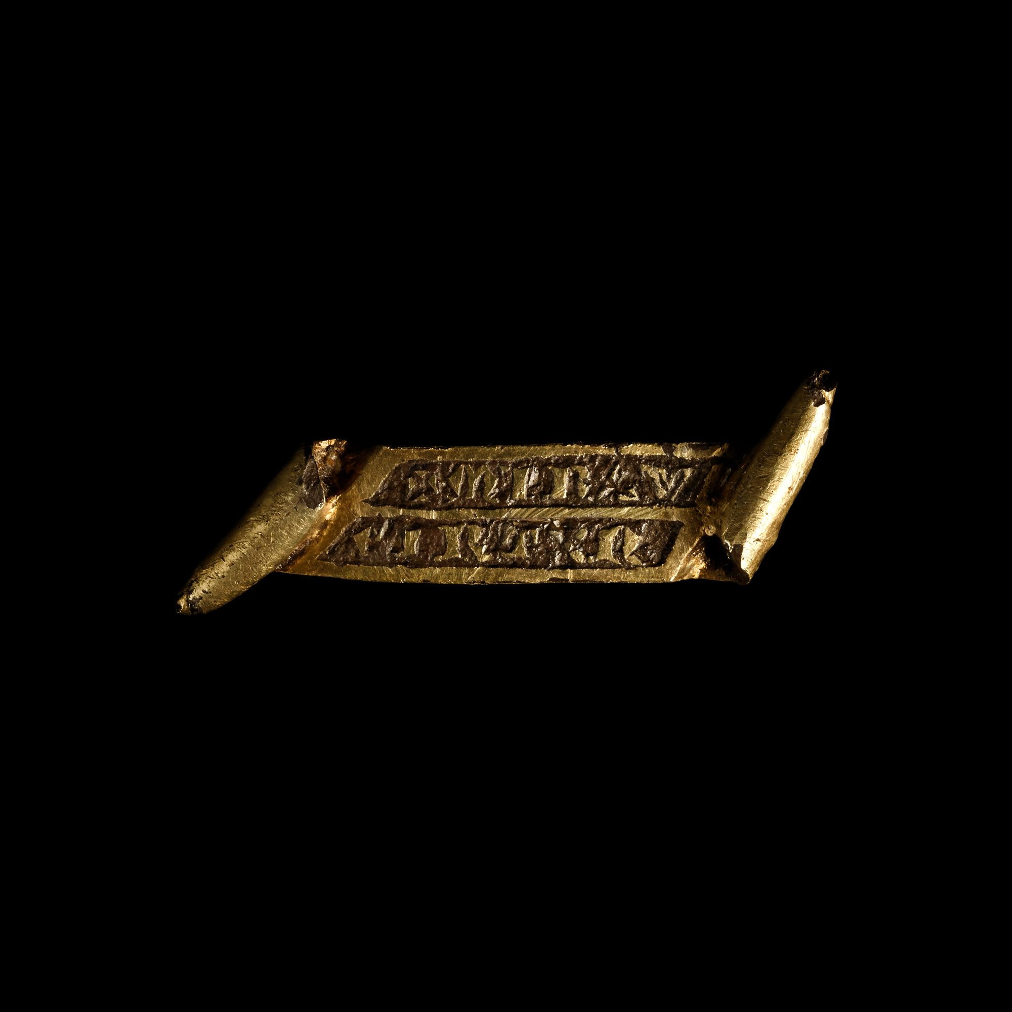 'The Somersham' Medieval Inscribed Silver-Gilt Scroll Mount or Badge
