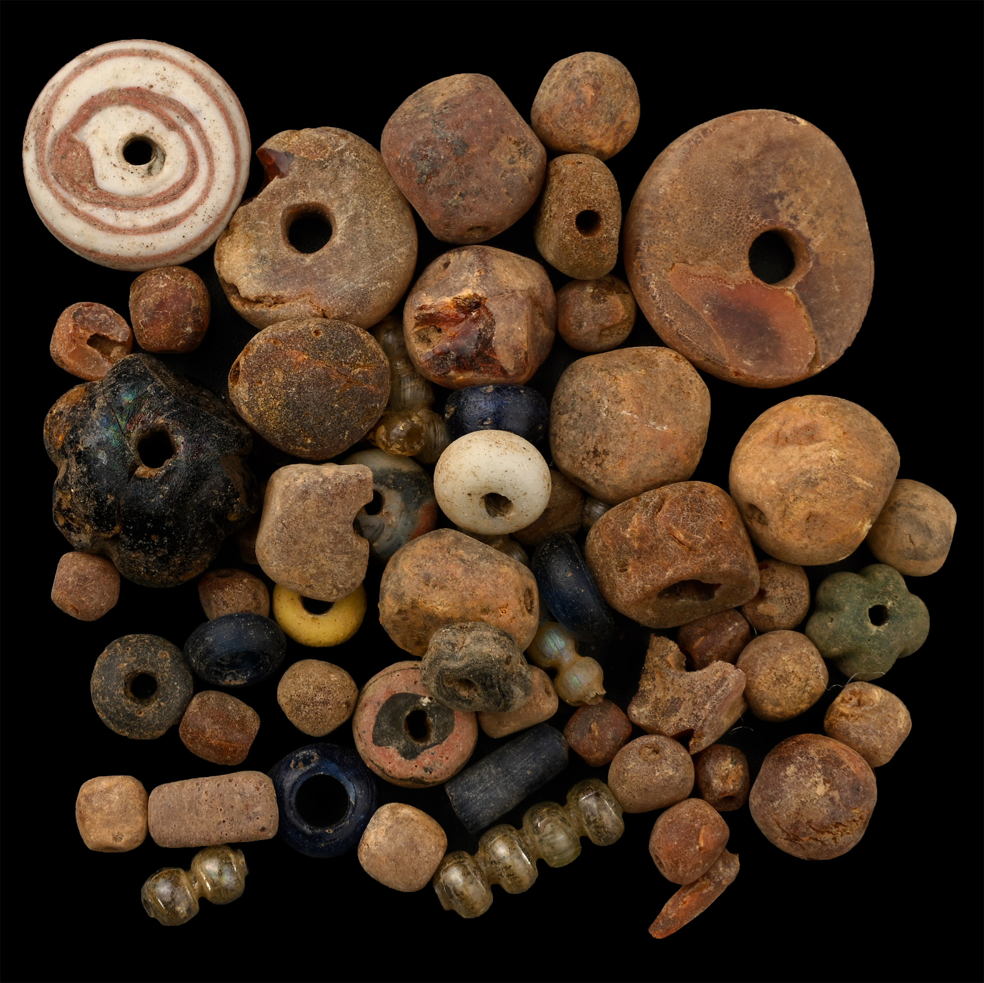 Anglo-Saxon Glass and Amber Necklace Bead Group.