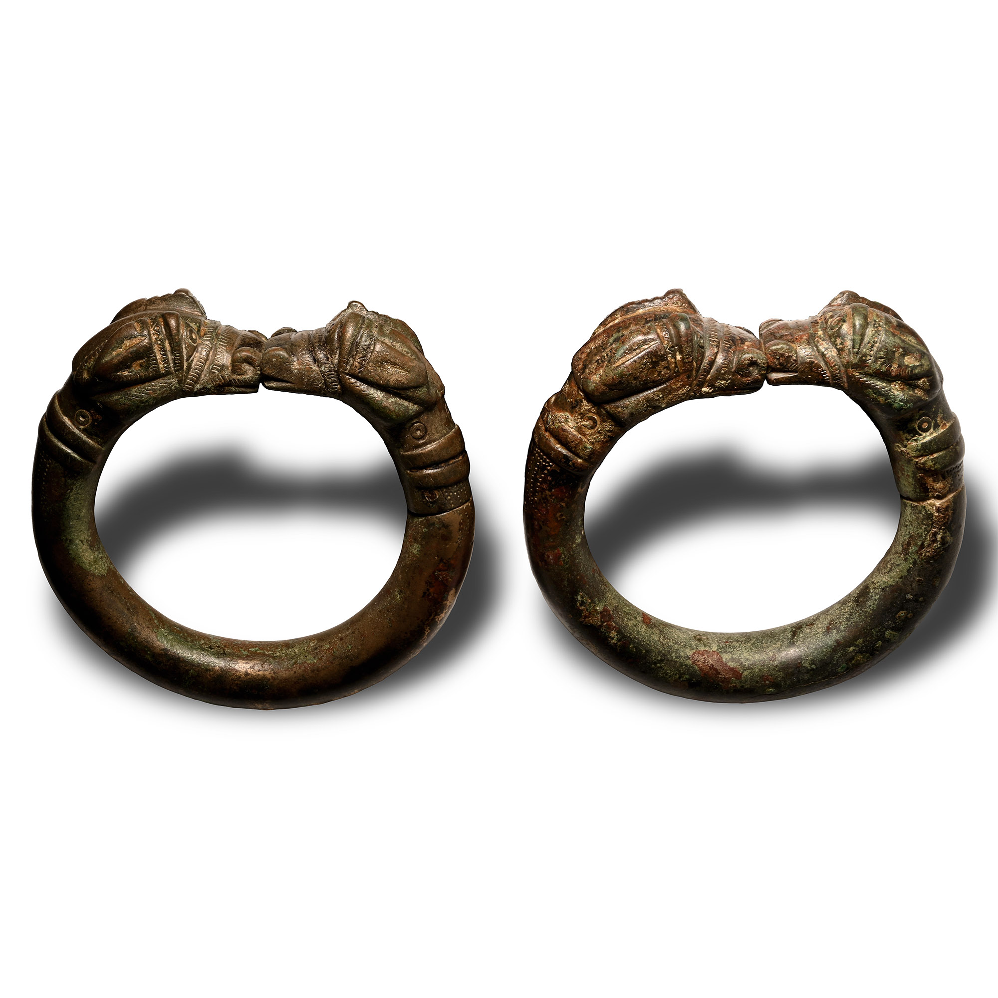 Monumental Luristan Bronze Armband Pair with Dragon Heads