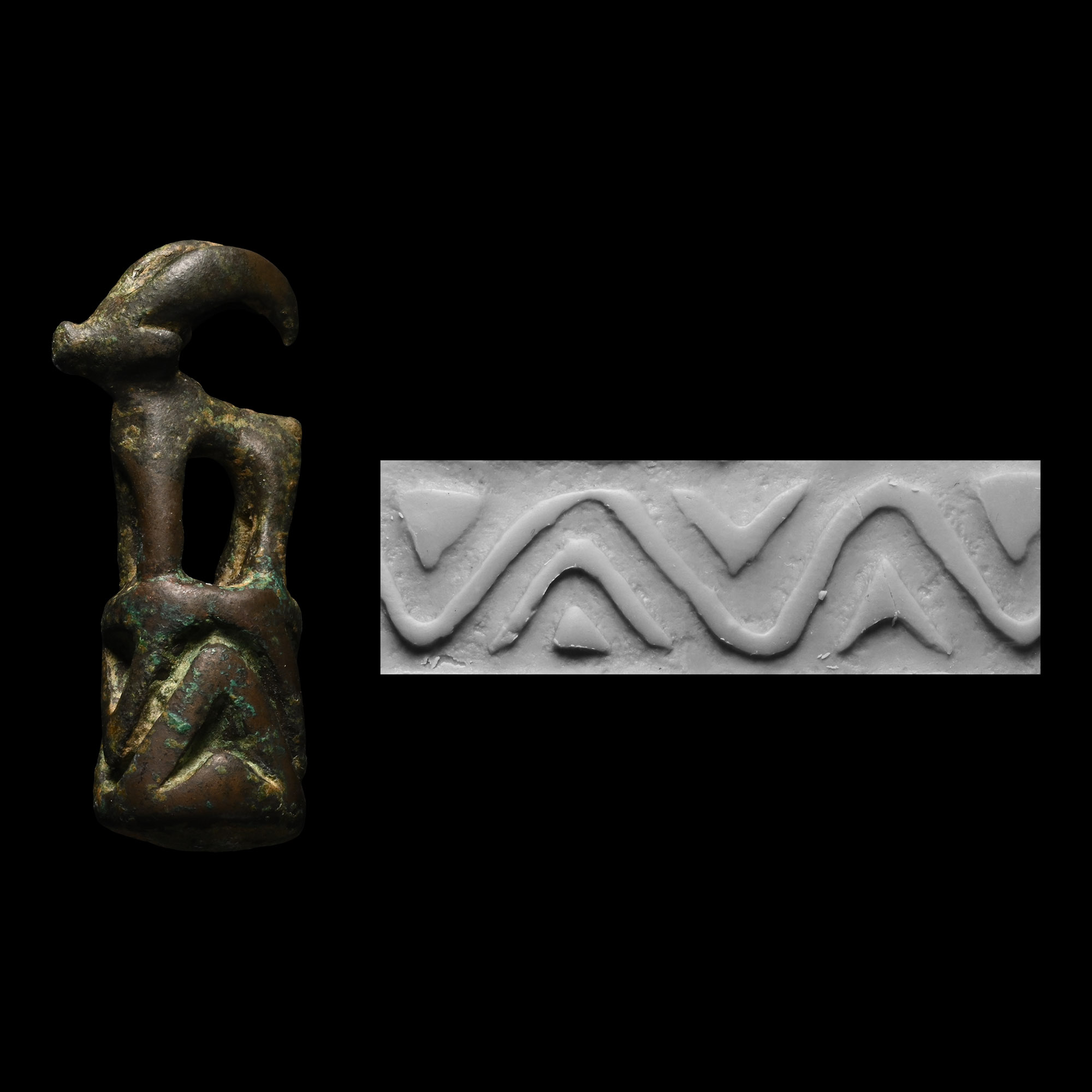 Anatolian Bronze Cylinder Seal Surmounted by Horned Animal