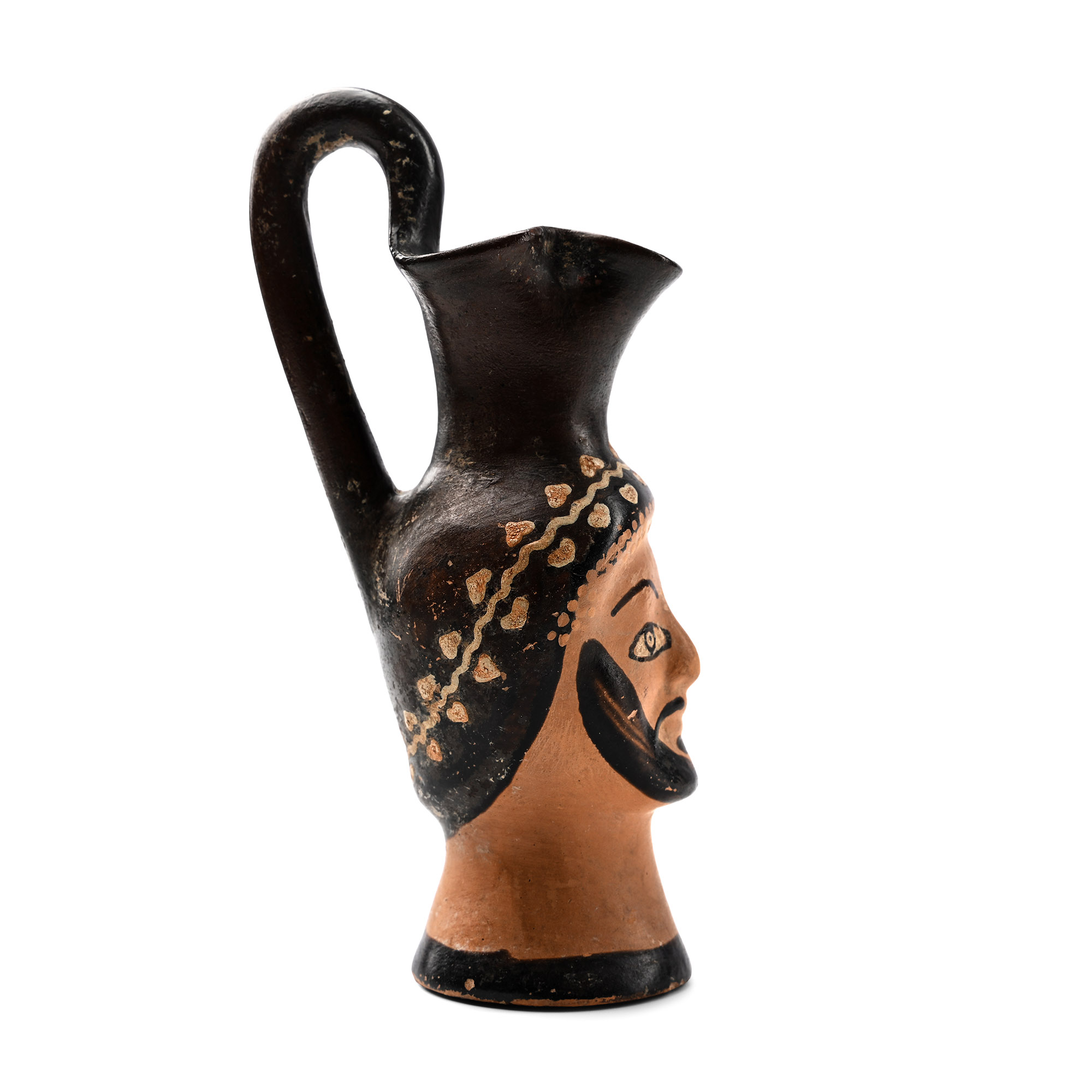 Greek 'Plastic' Oinochoe with a Bust of a Bearded Man