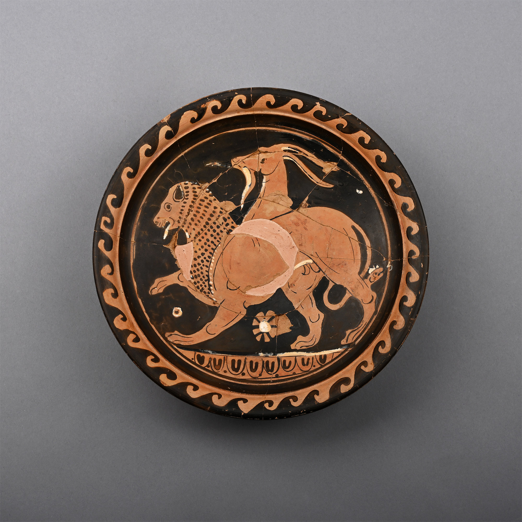An Apulian red-figure patera painted with a chimera