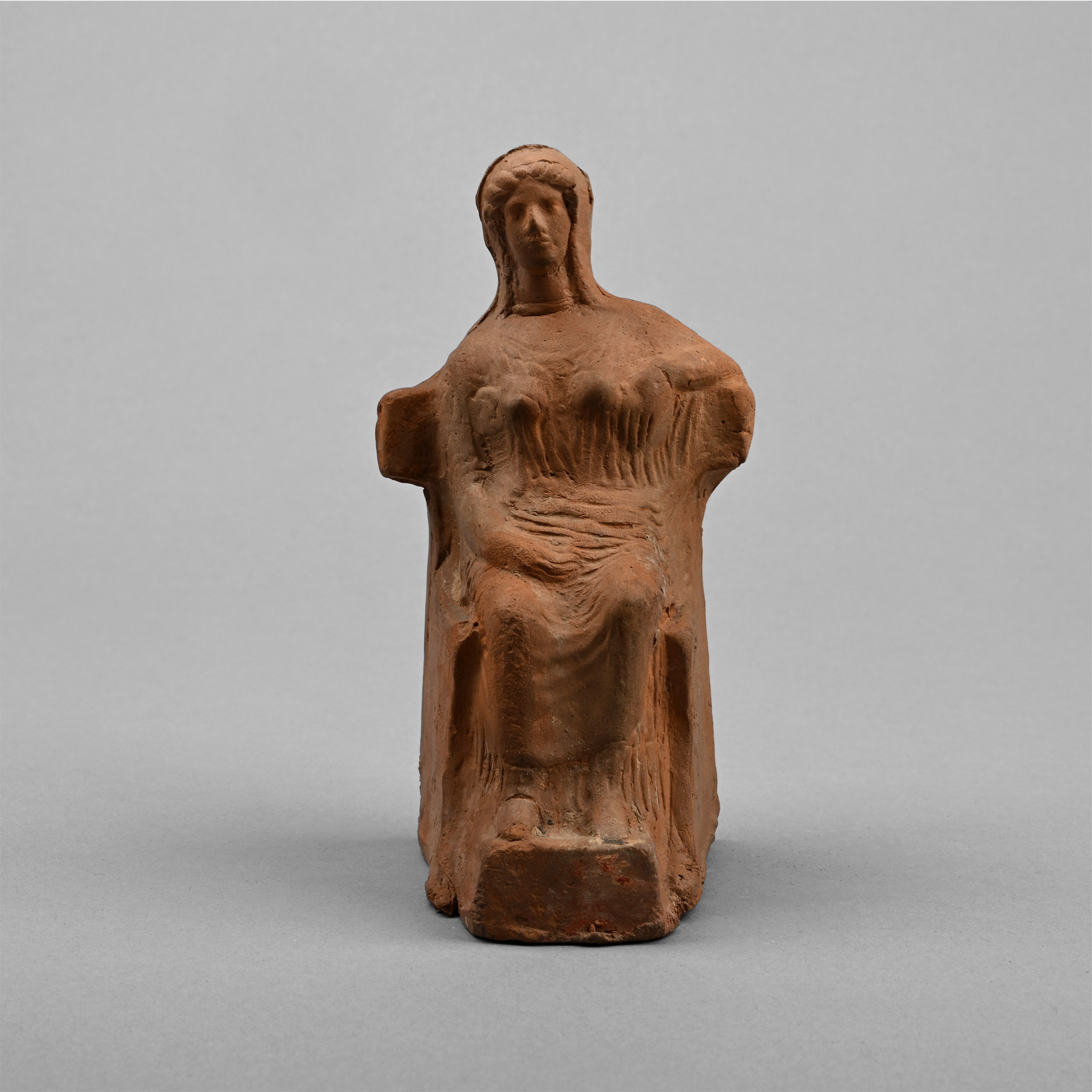 Greek Terracotta Figure of a Seated Goddess