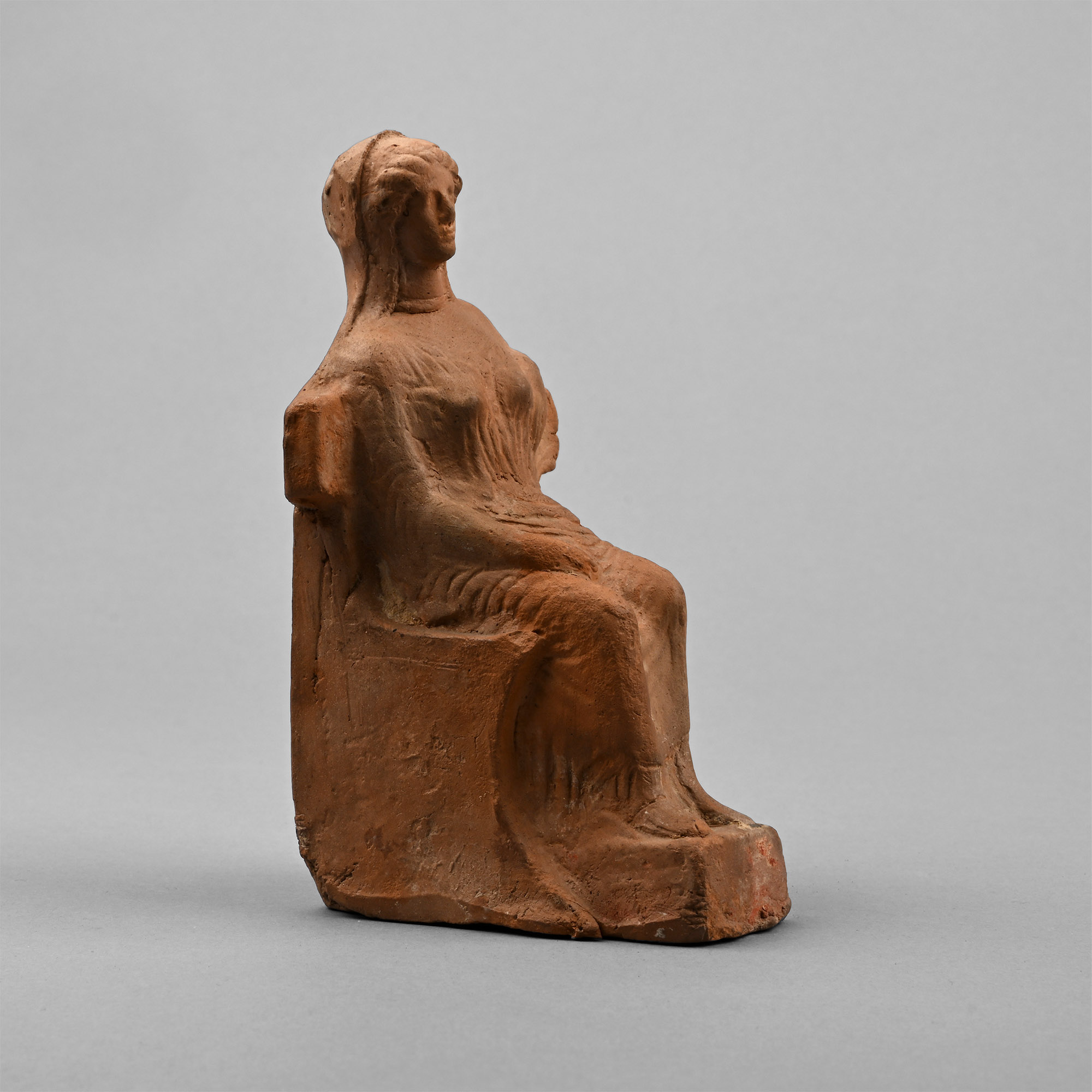 Greek Terracotta Figure of a Seated Goddess
