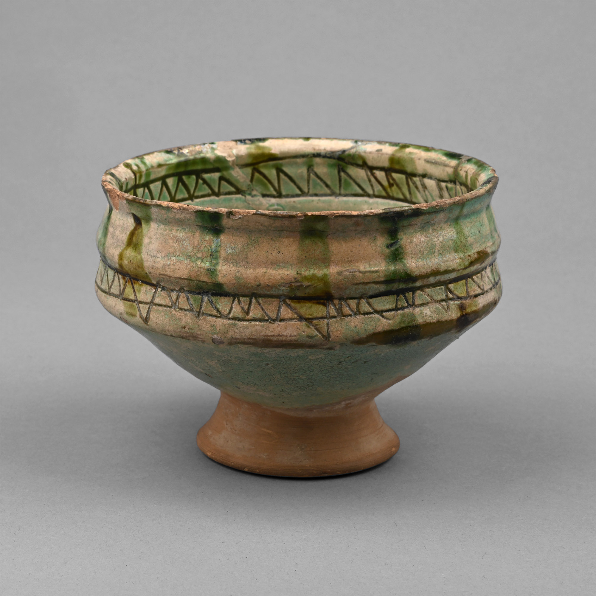 Byzantine Green Glazed Sgraffito Footed Bowl