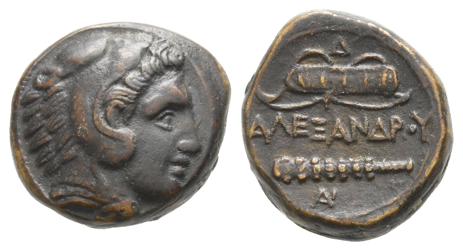 A bronze coin of Alexander the Great: the head of Herakles in a lion-skin headdress, with a club and bow-case reverse