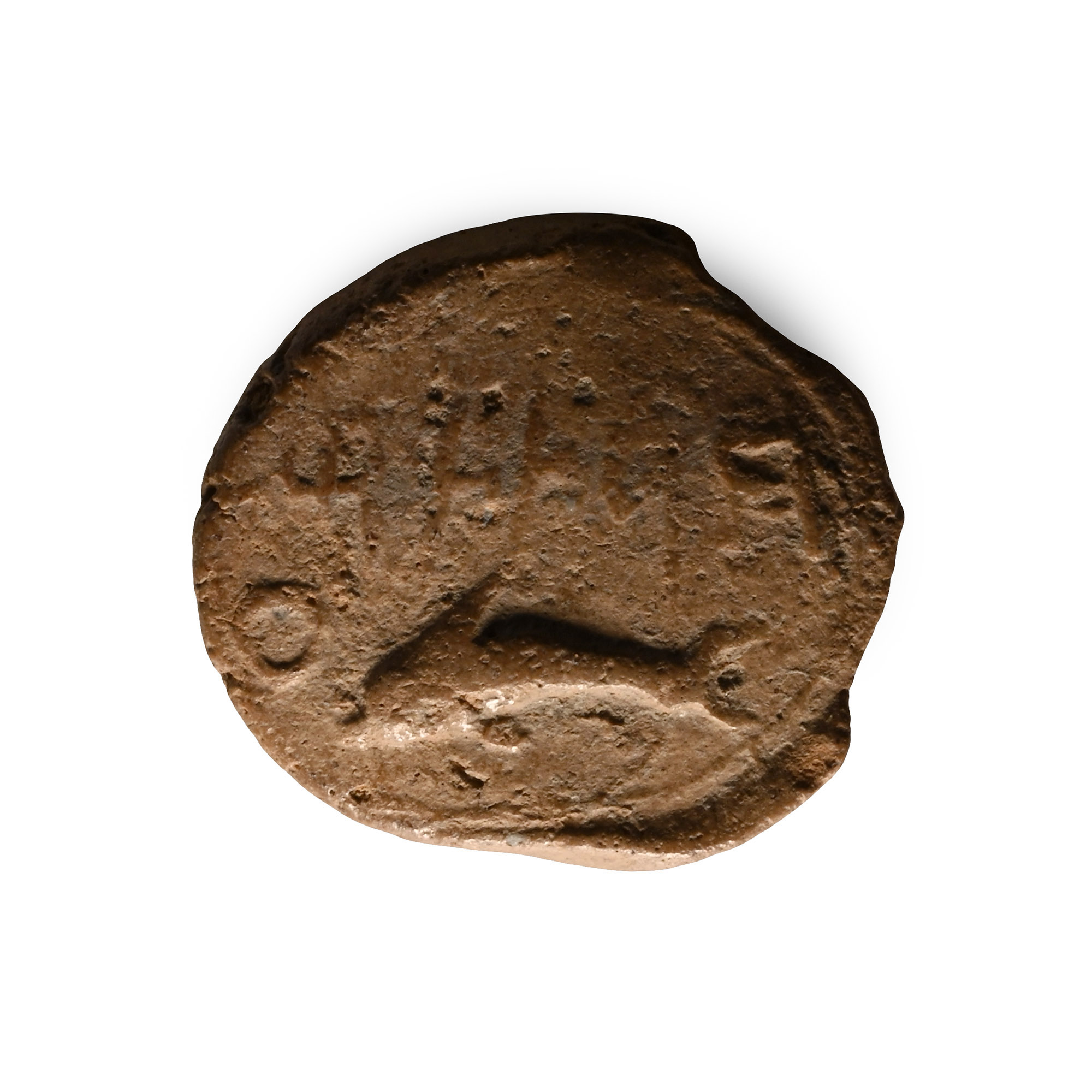 Phoenician Terracotta Bulla with a Dolphin