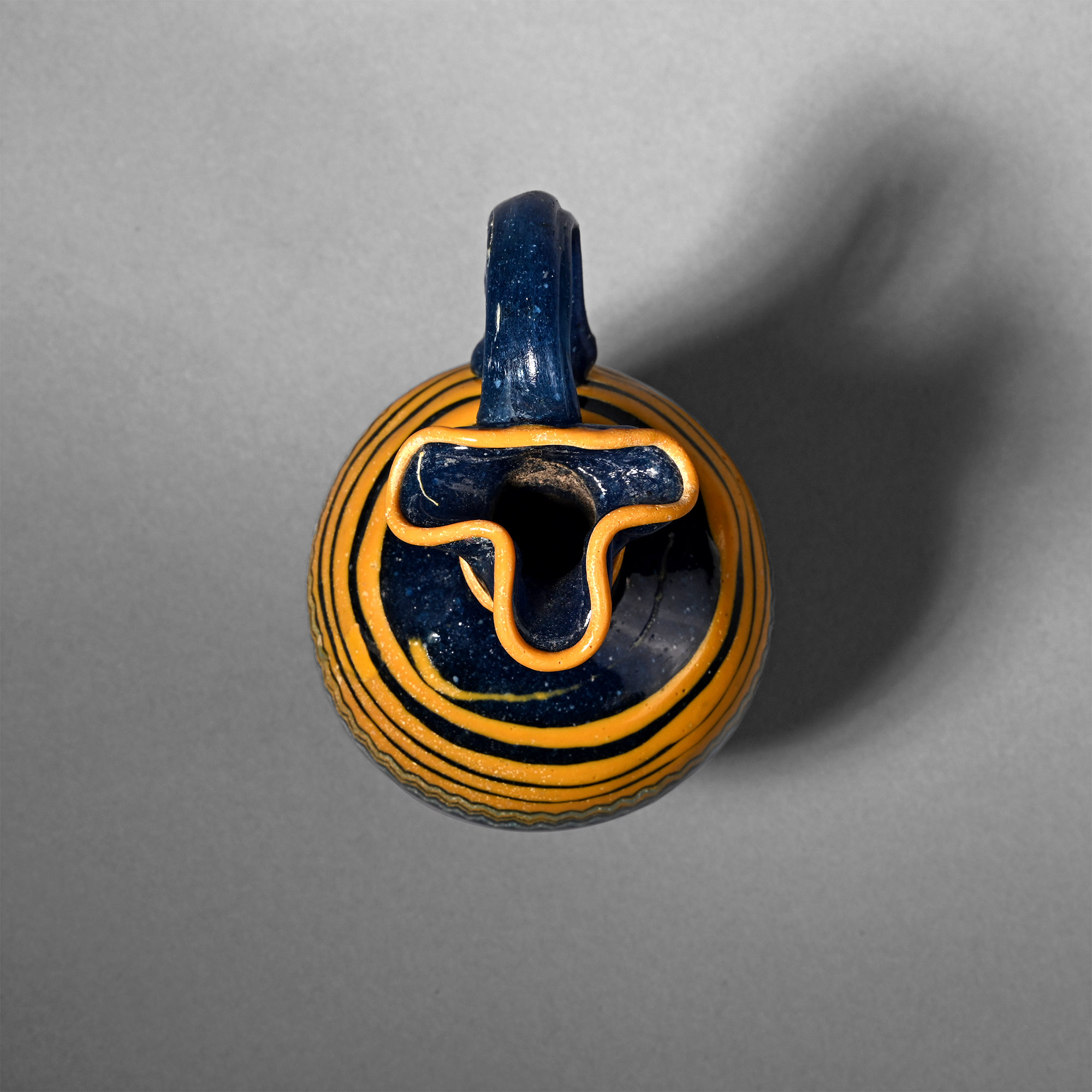 'The Cyrus Collection' Greek Core-Formed Glass Oinochoe