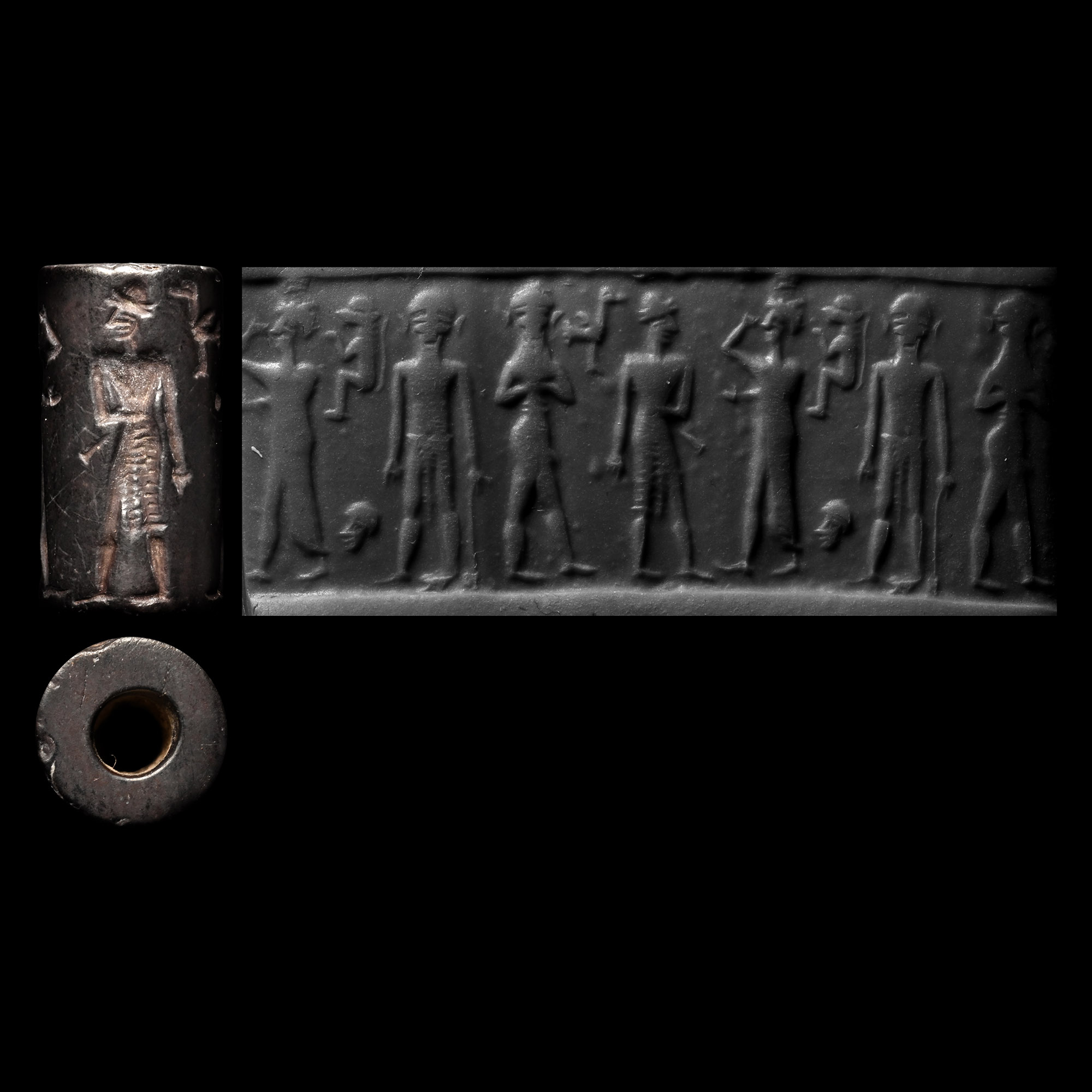 Mesopotamian Haematite Cylinder Seal with Standing Figures